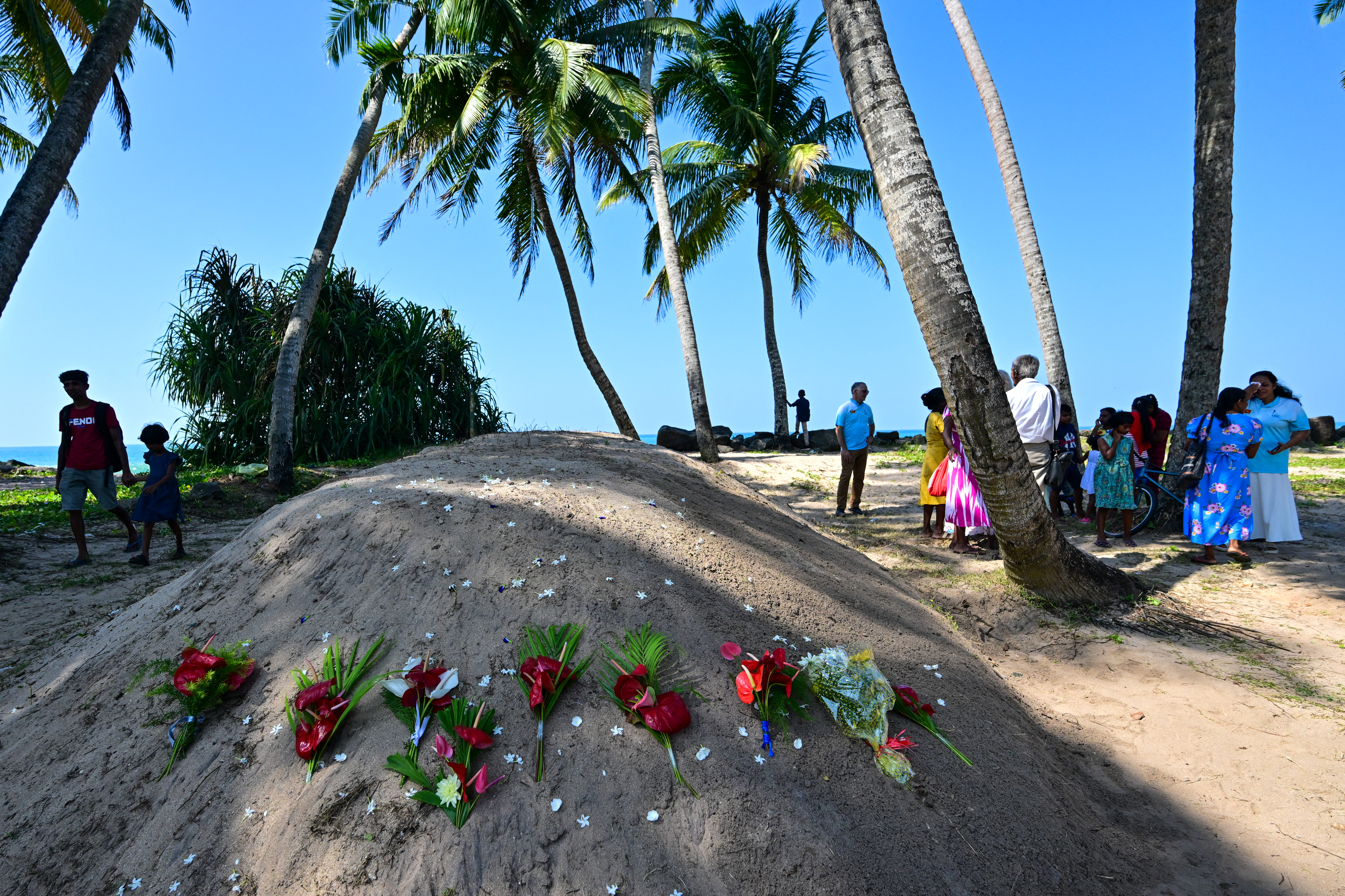 Tearful Asia mourns 220,000 tsunami victims on 20th anniversary