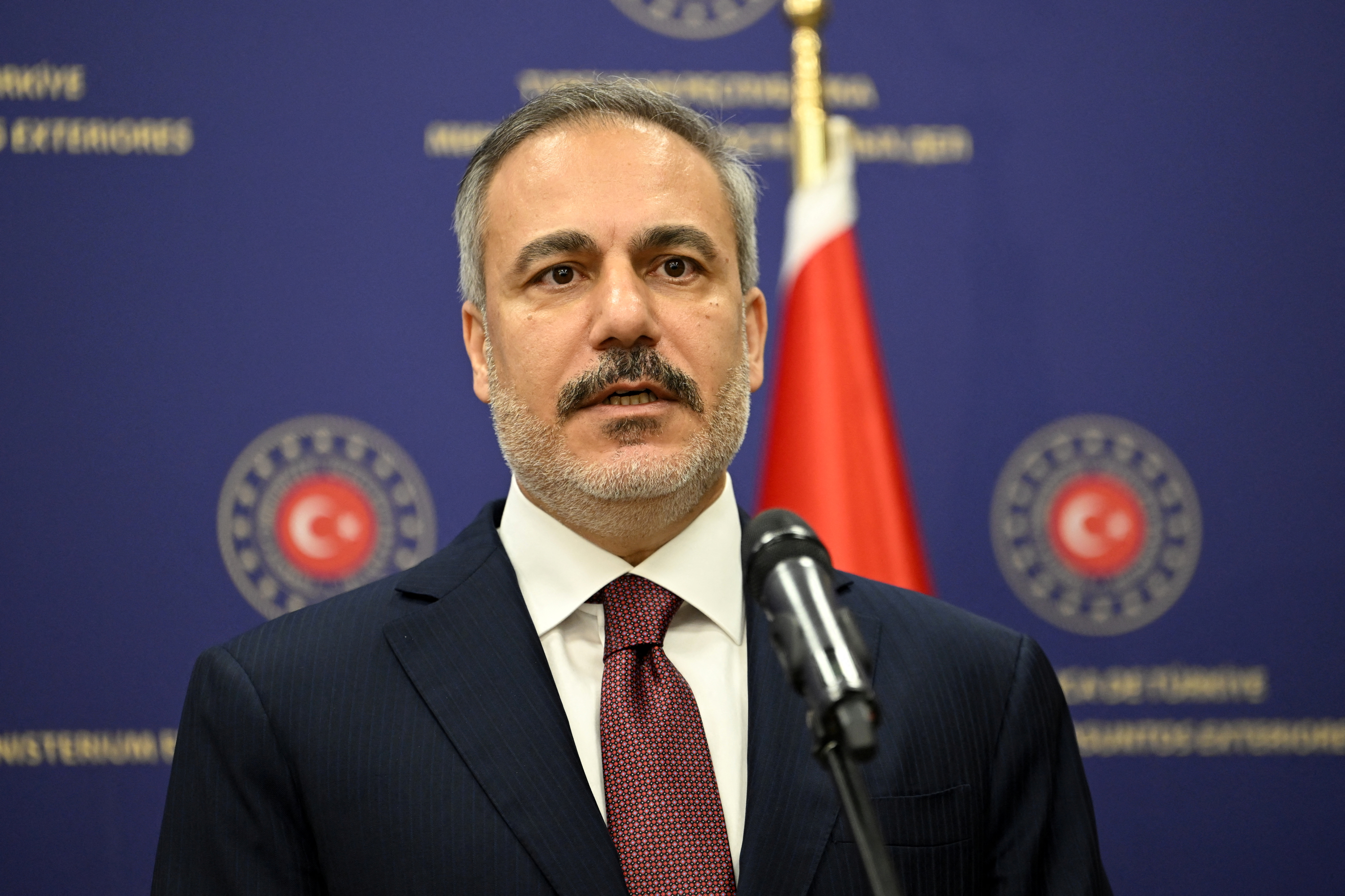 Turkish Foreign Minister Hakan Fidan speaks during a joint press conference [Filer: ANDREW CABALLERO-REYNOLDS/Reuters]