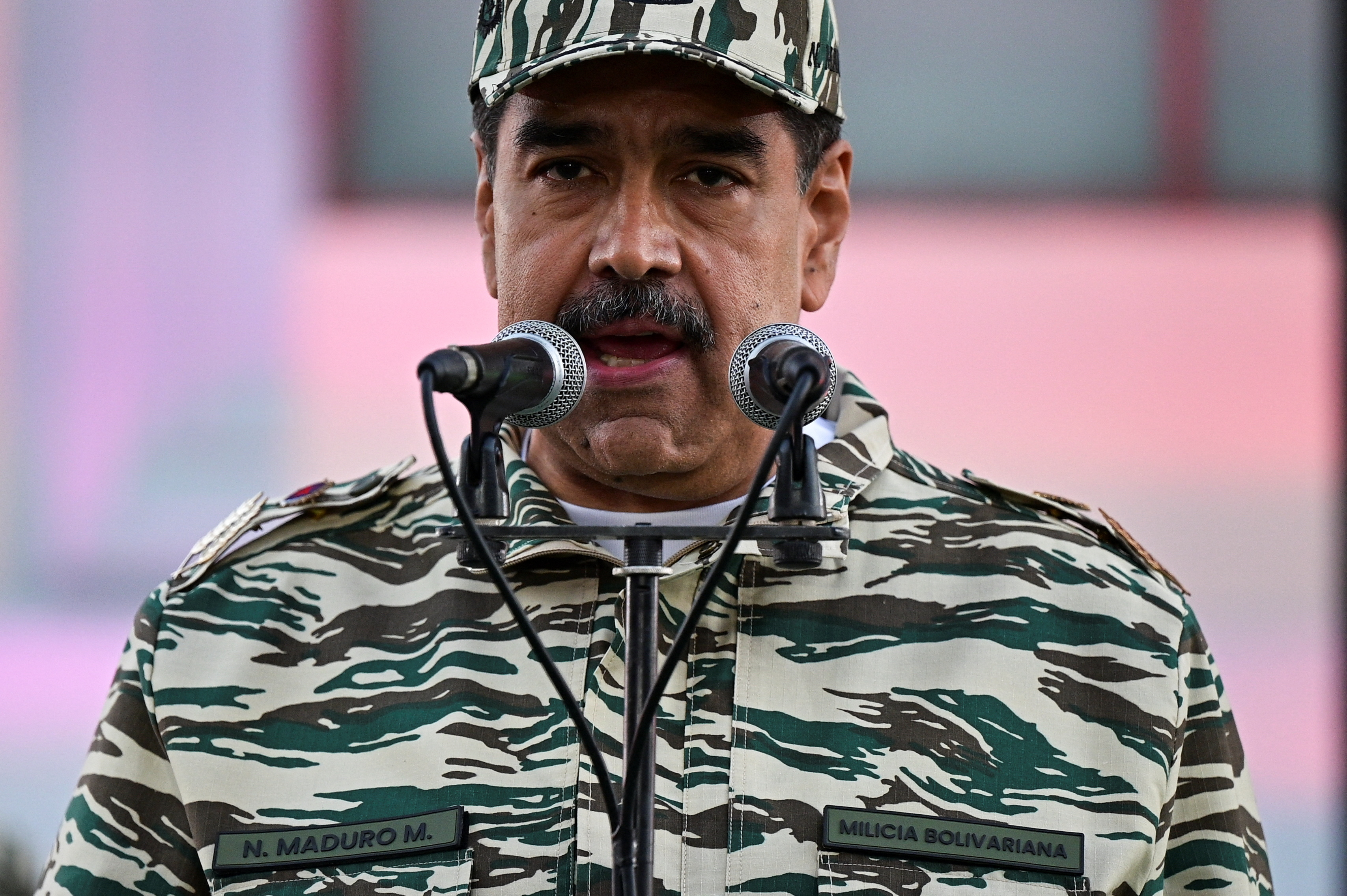 Venezuela’s President Nicolas Maduro addresses members of the Bolivarian Militia and a combatant force, days before he is set to officially begin his third term in office, in Caracas, Venezuela January 7, 2025. REUTERS/Gaby Oraa