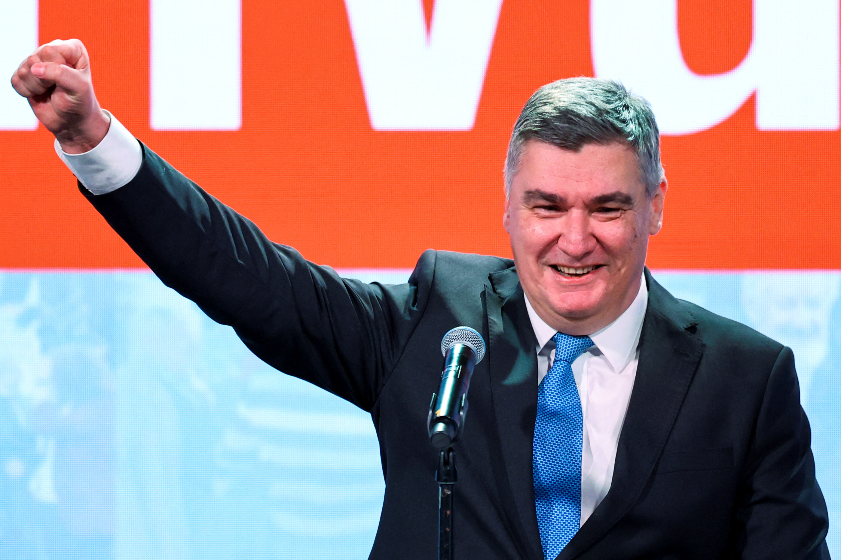 Croatian President and presidential candidate Zoran Milanovic gestures