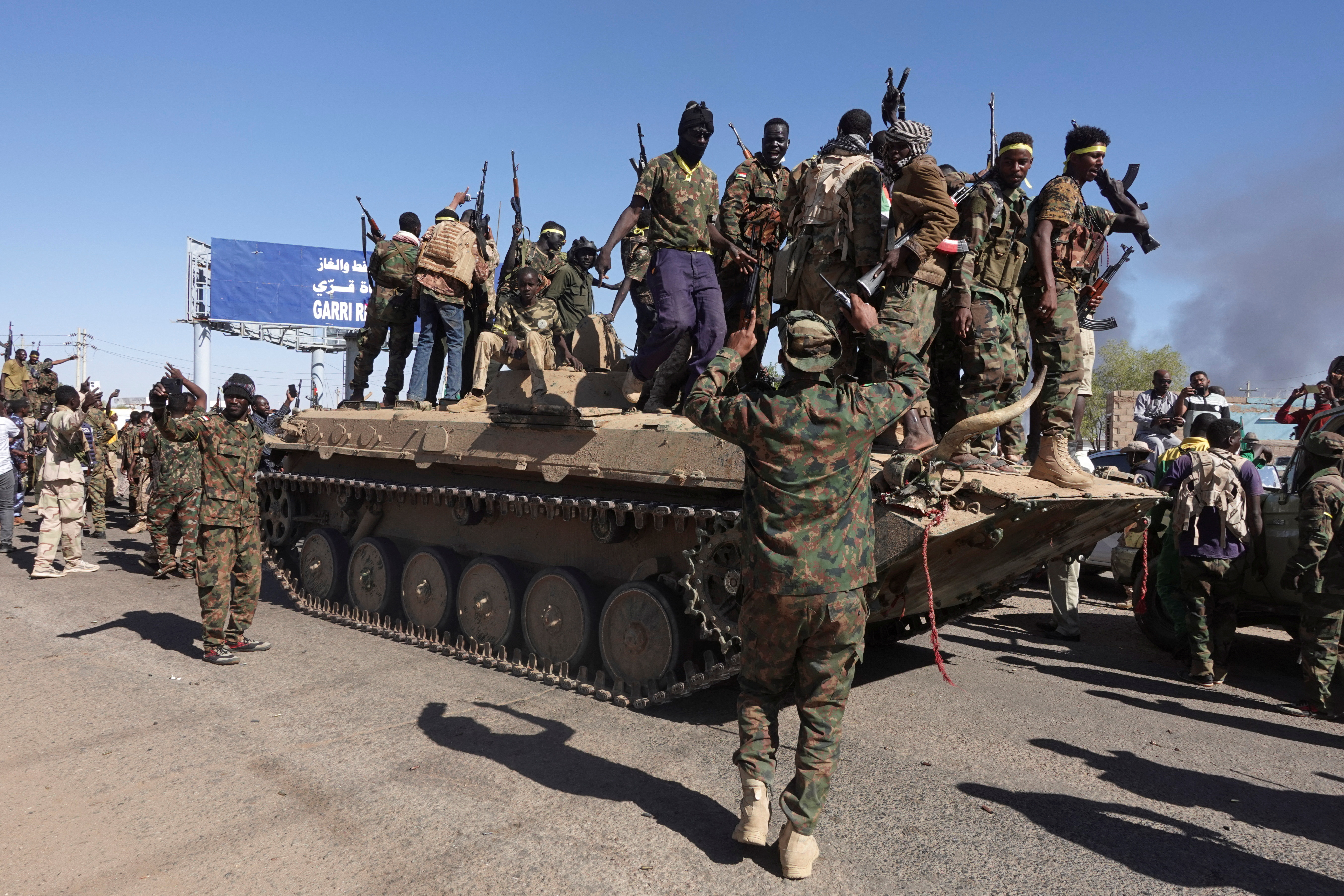 Soldiers from the Sudanese Armed Forces (SAF) celebrate the army&#039;s liberation of an oil refinery, in North Bahri, Sudan, January 25, 2025 [El Tayeb Siddig/Reuters]