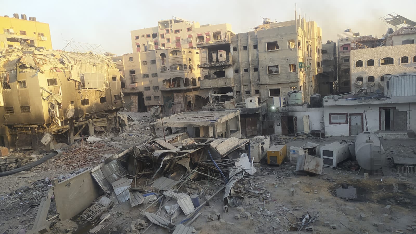 A view of destruction following the Israeli attack on the courtyard of Kamal Adwan Hospital and its surrounding buildings in Beit Lahya, Gaza on December 25, 2024. [Khalil Ramzi Alkahlut/Anadolu Agency]