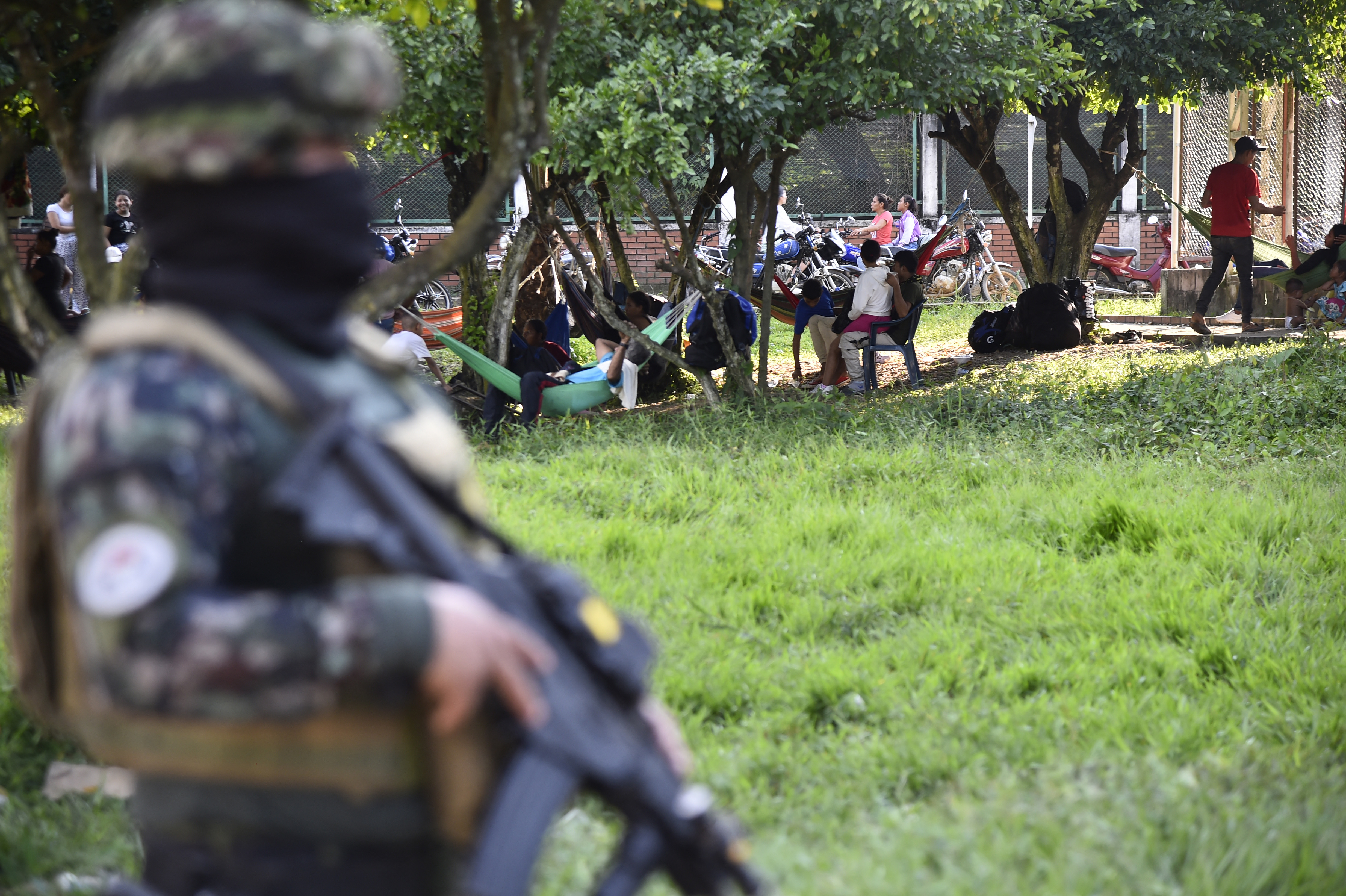 Colombian army soldiers stand guard in the municipality of Tibu, Norte de Santander
