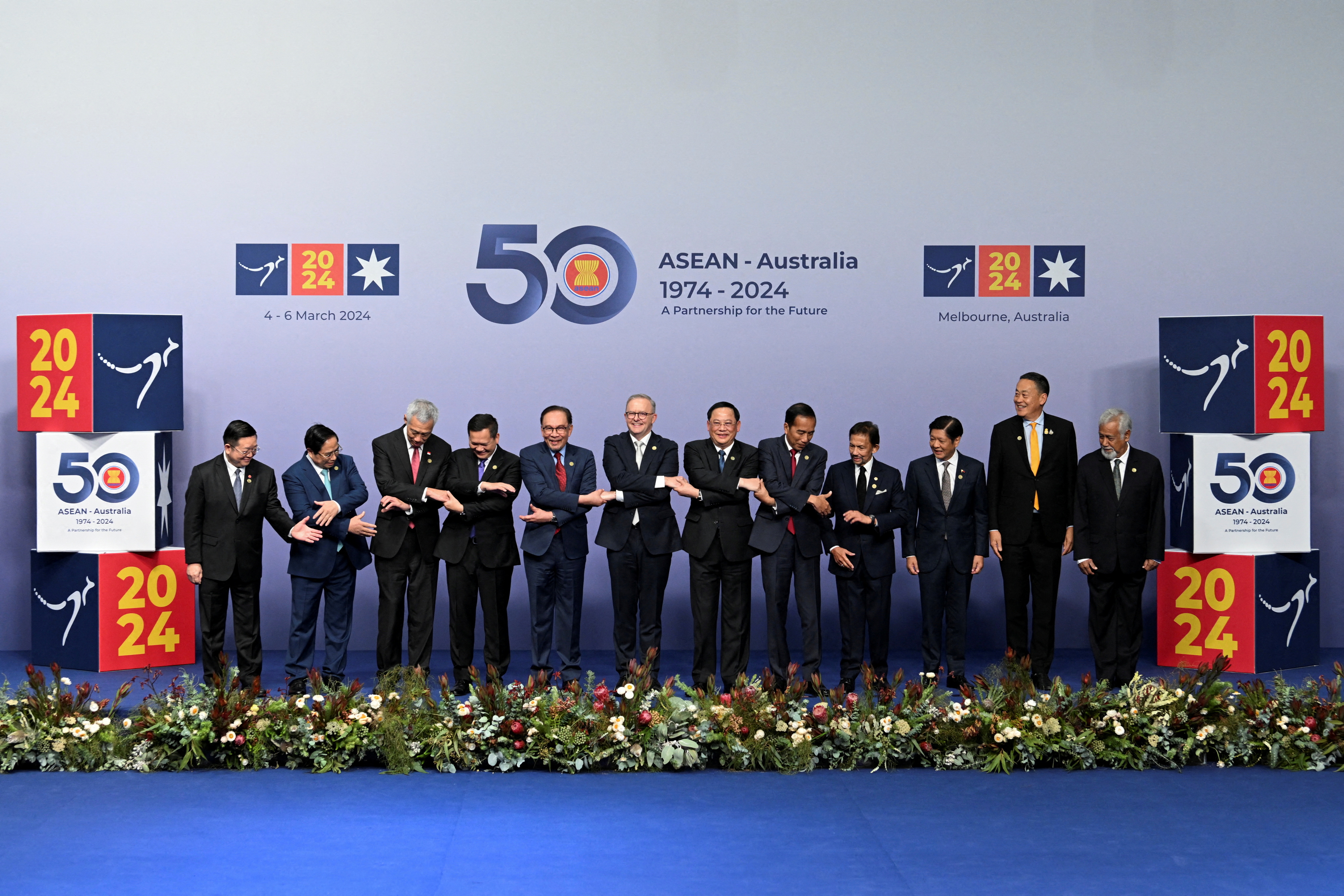 Australia's Prime Minister Anthony Albanese,  Laos' Prime Minister Sonexay Siphandone, Brunei's Sultan Hassanal Bolkiah, Cambodia's Prime Minister Hun Manet, Indonesia's President Joko Widodo, Malaysia's Prime Minister Anwar Ibrahim, Philippines President Ferdinand Marcos Jr, Singapore's Prime Minister Lee Hsien Loong, Thailand's Prime Minister Srettha Thavisin, Vietnam's Prime Minister Pham Minh Chinh, Prime Minister of Timor-Leste Xanana Gusmao and Secretary-General of ASEAN, Dr Kao Kim Hourn pose for a family photo at the ASEAN-Australia Special Summit, in Melbourne, Australia March 5, 2024. REUTERS/Jaimi Joy