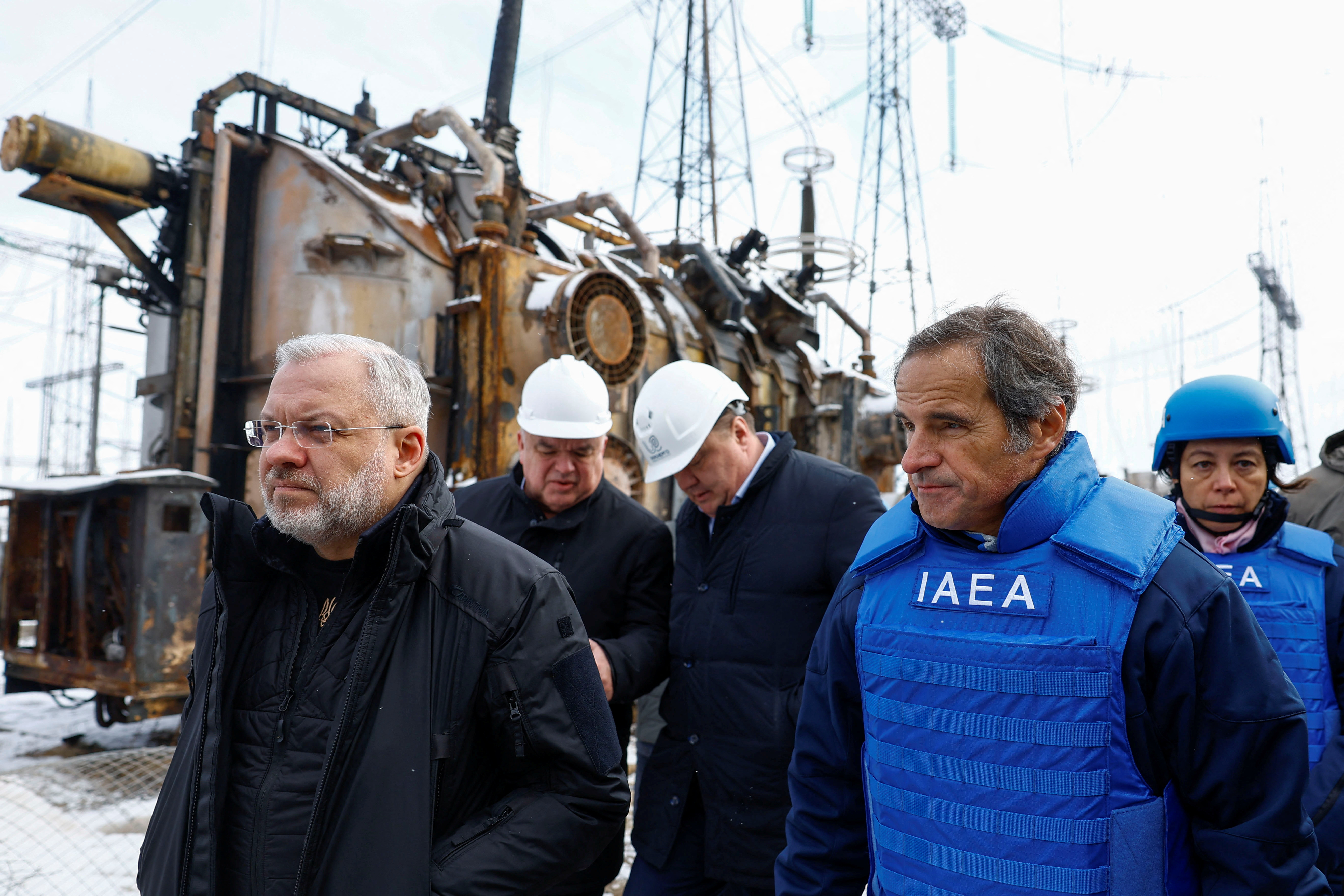 International Atomic Energy Agency (IAEA) Director General Rafael Grossi and Ukrainian Energy Minister German Galushchenko visit energy infrastructure facility which was damaged during Russian missile and drone strikes, amid Russia's attack on Ukraine, in an undisclosed location in Ukraine February 4, 2025. REUTERS/Valentyn Ogirenko