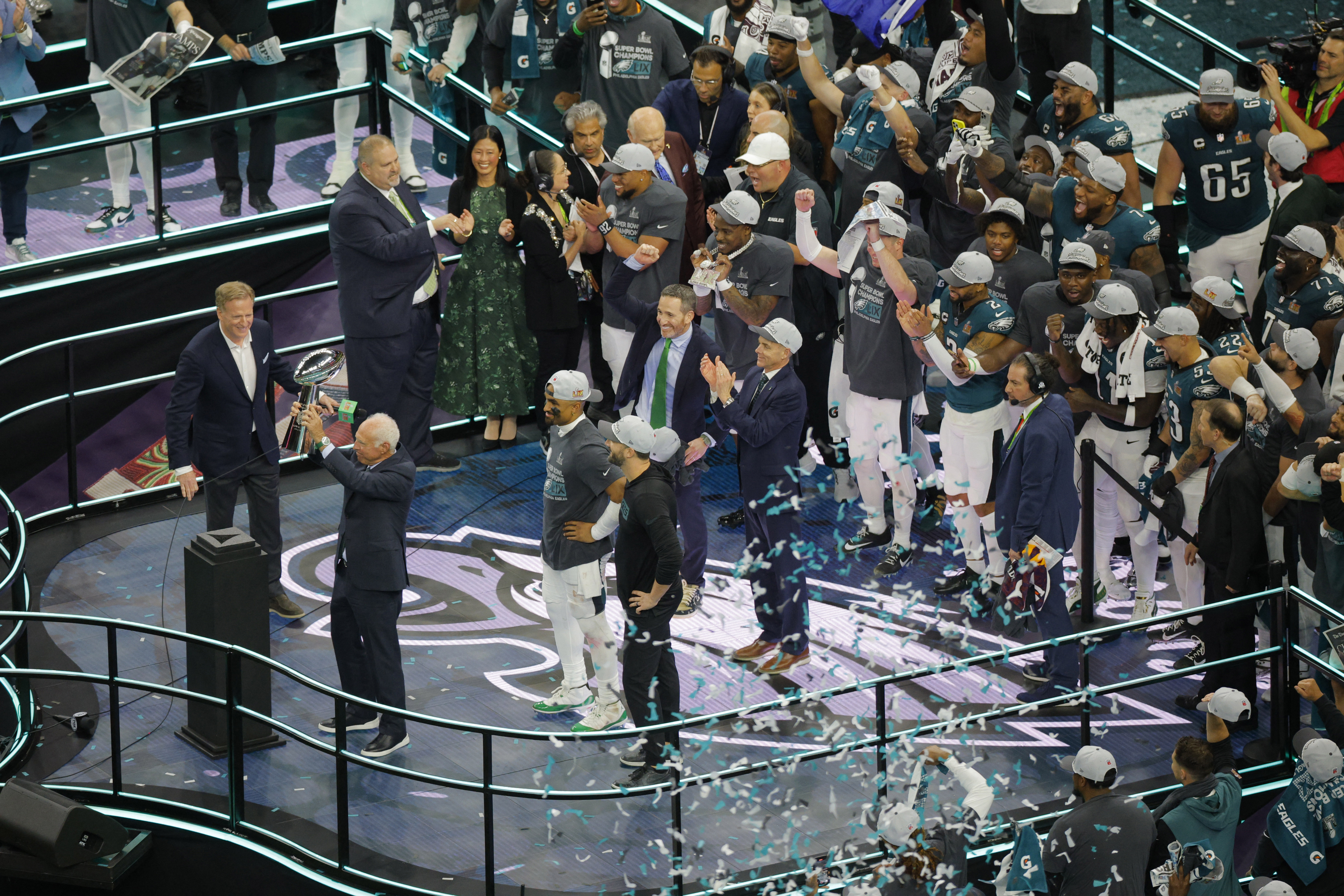 Football - NFL - Super Bowl LIX - Philadelphia Eagles v Kansas City Chiefs - Caesars Superdome, New Orleans, Louisiana, United States - February 9, 2025 Philadelphia Eagles owner Jeffrey Lurie lifts the Vince Lombardi Trophy as he celebrates after winning Super Bowl LIX alongside Jalen Hurts and head coach Nick Sirianni REUTERS/Brian Snyder
