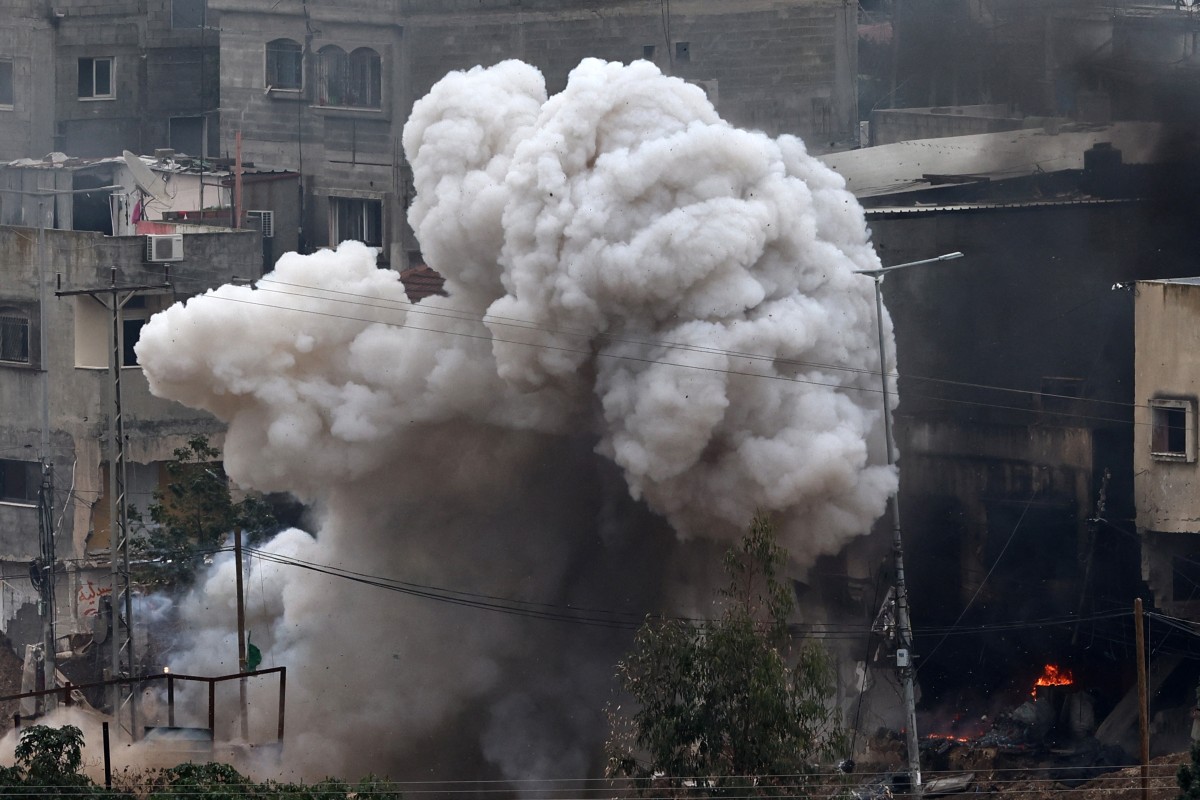 Smoke billows after an explosion during an Israeli raid in the Nur Shams refugee camp near Tulkarem in the occupied West Bank