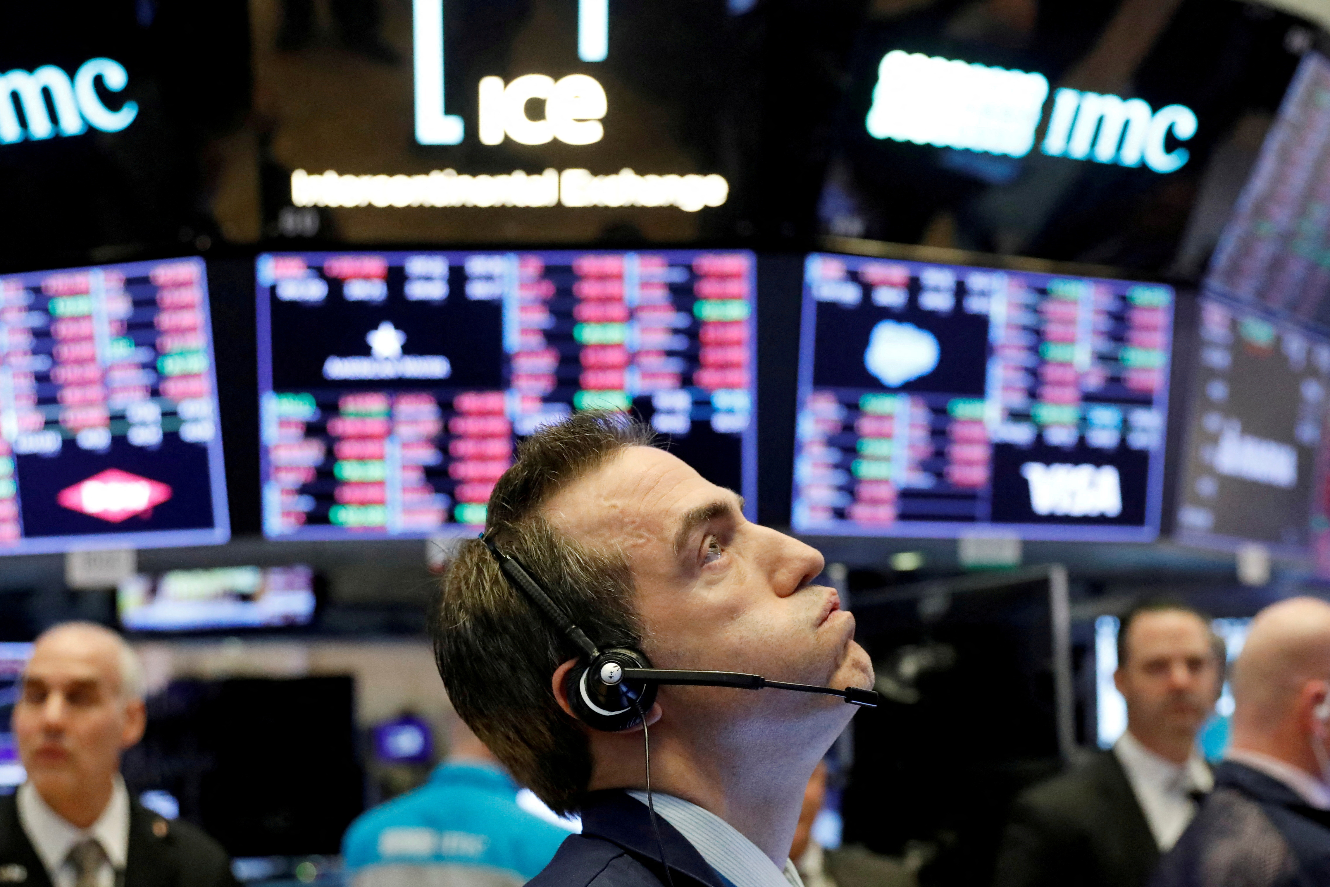 A trader works on the floor of the New York Stock Exchange.