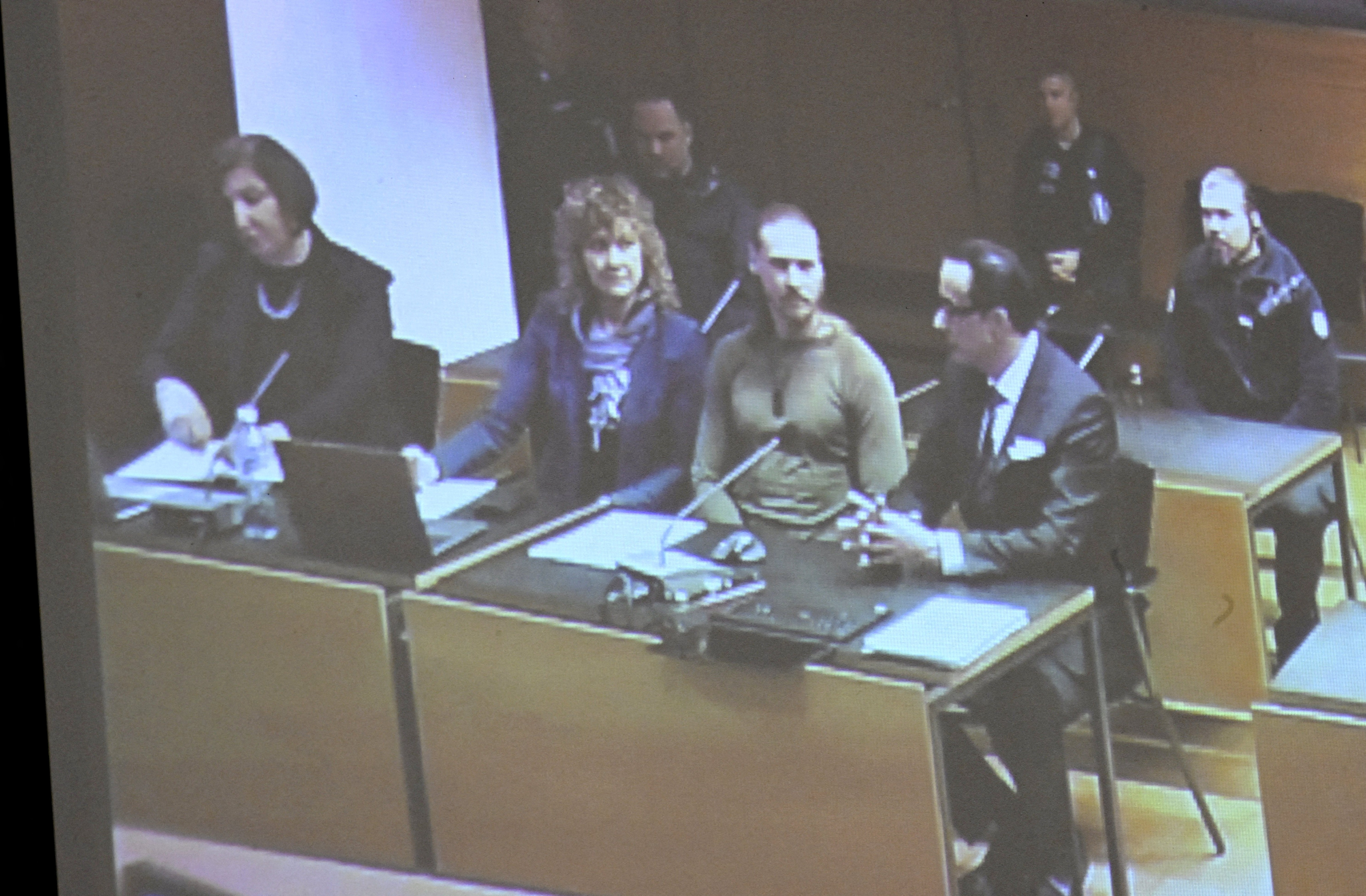 Voislav Torden, an ex-commander of the Russian far-right Rusich paramilitary group, attends a trial, as projected on a screen, in Helsinki, Finland December 5, 2024 [File: Heikki Saukkomaa/ Lehtikuva via Reuters]