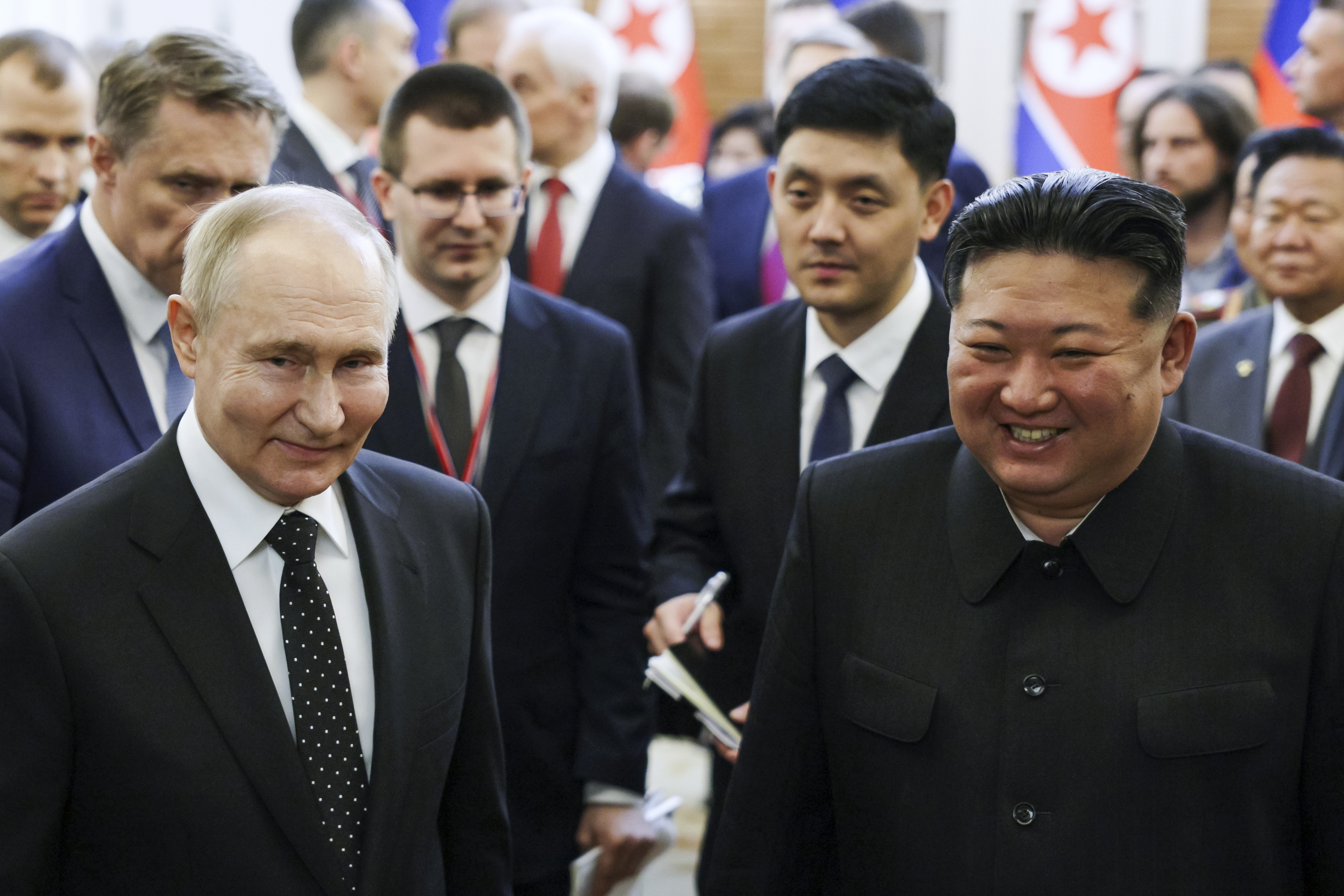 Russian President Vladimir Putin, left, and North Korea's leader Kim Jong Un smile together in Pyongyang, North Korea, on June 19, 2024. (Gavriil Grigorov, Sputnik, Kremlin Photo via AP, File)