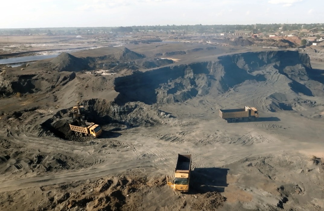 Trucks at the “Black Mountain,” the concession of Enviro Processing Limited (EPL) that holds much of Kabwe’s mine lead waste.