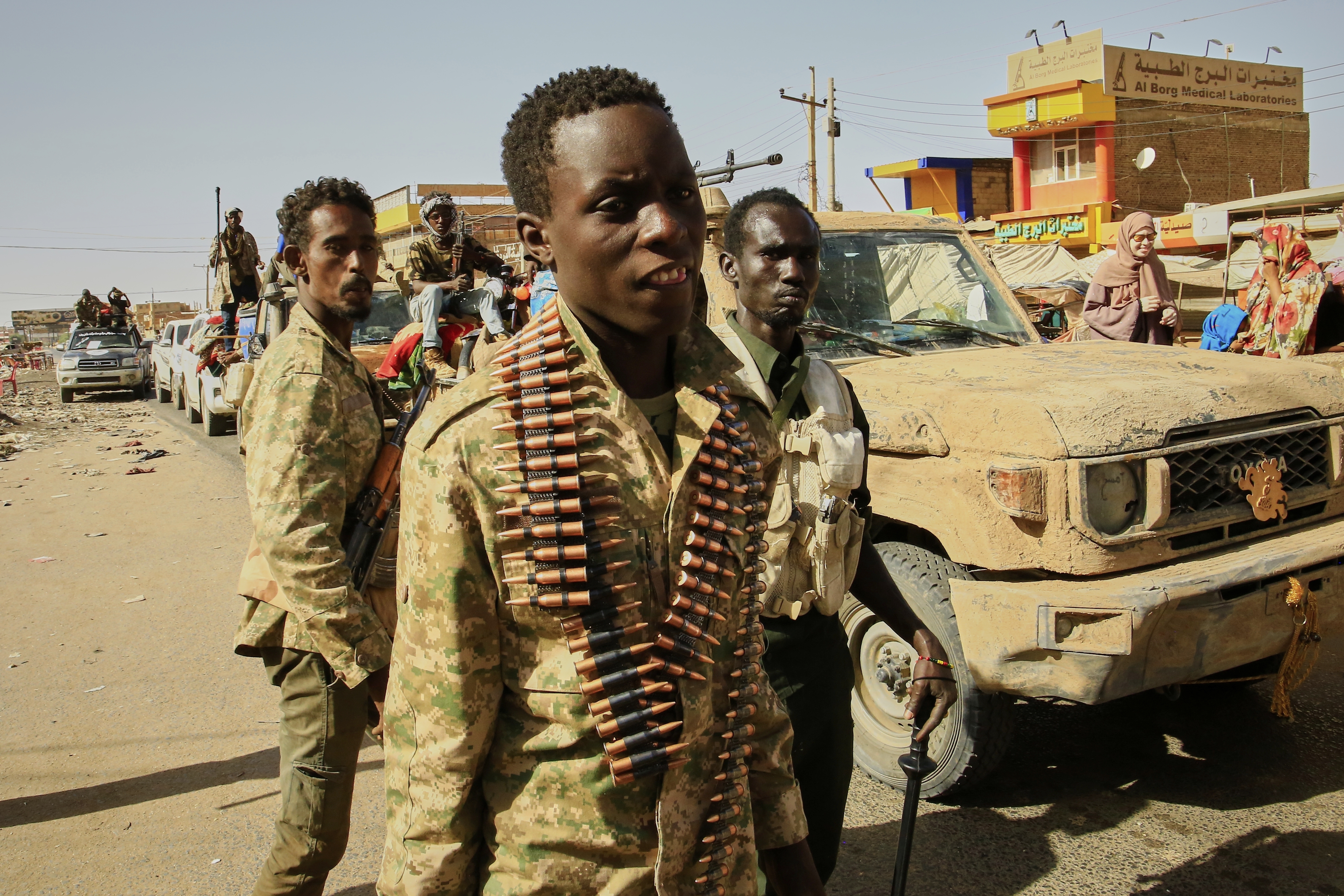 Soldiers arrive to the Allafah market, in an area recently recaptured by Sudan's army from the Rapid Support Forces paramilitary group, in the Al Kalalah district, 40km south of Khartoum, Sudan, Thursday March 27, 2025. (AP Photo)