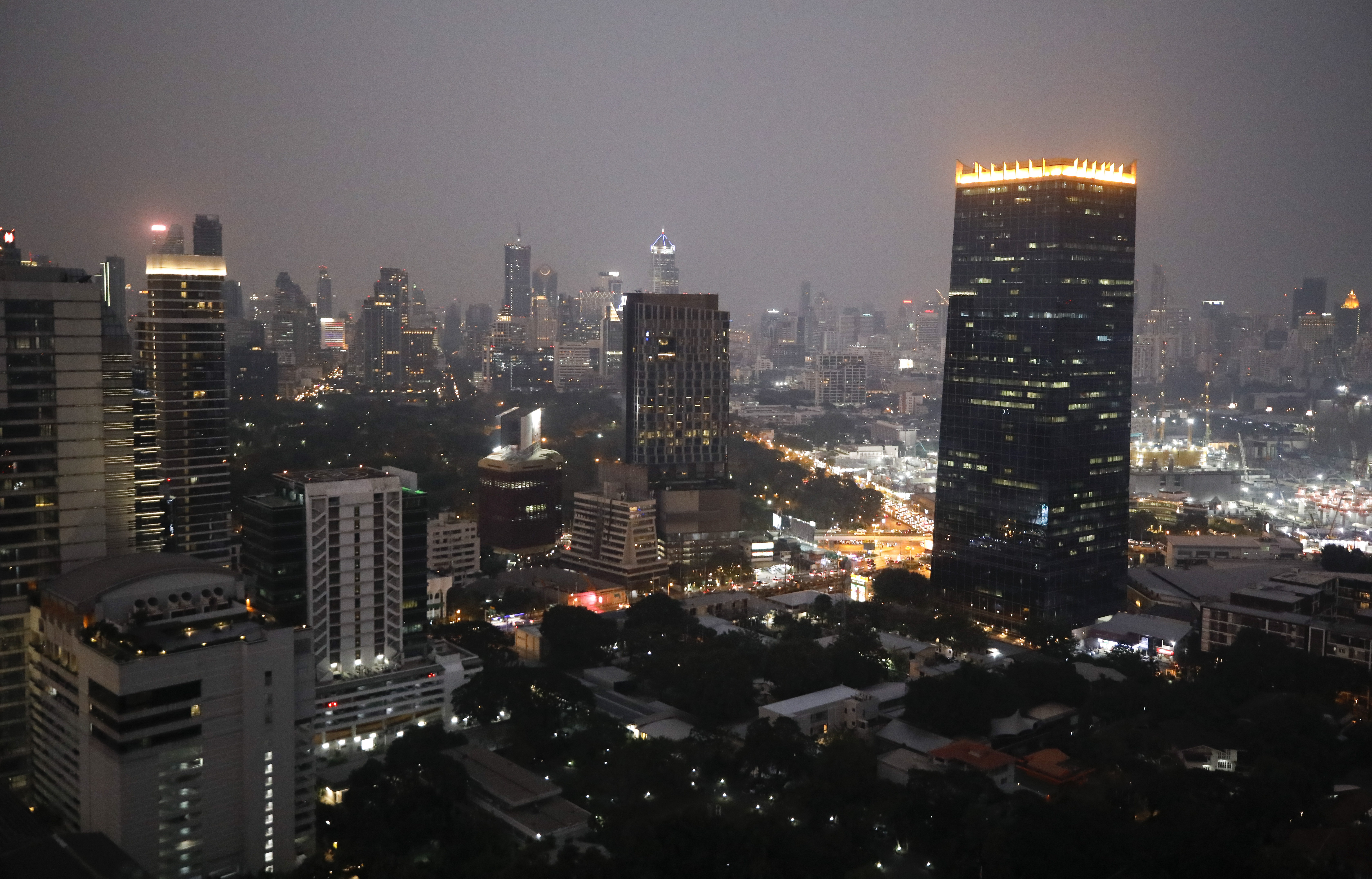 Heavy smog obscures the city skyline in Bangkok, Thailand.
