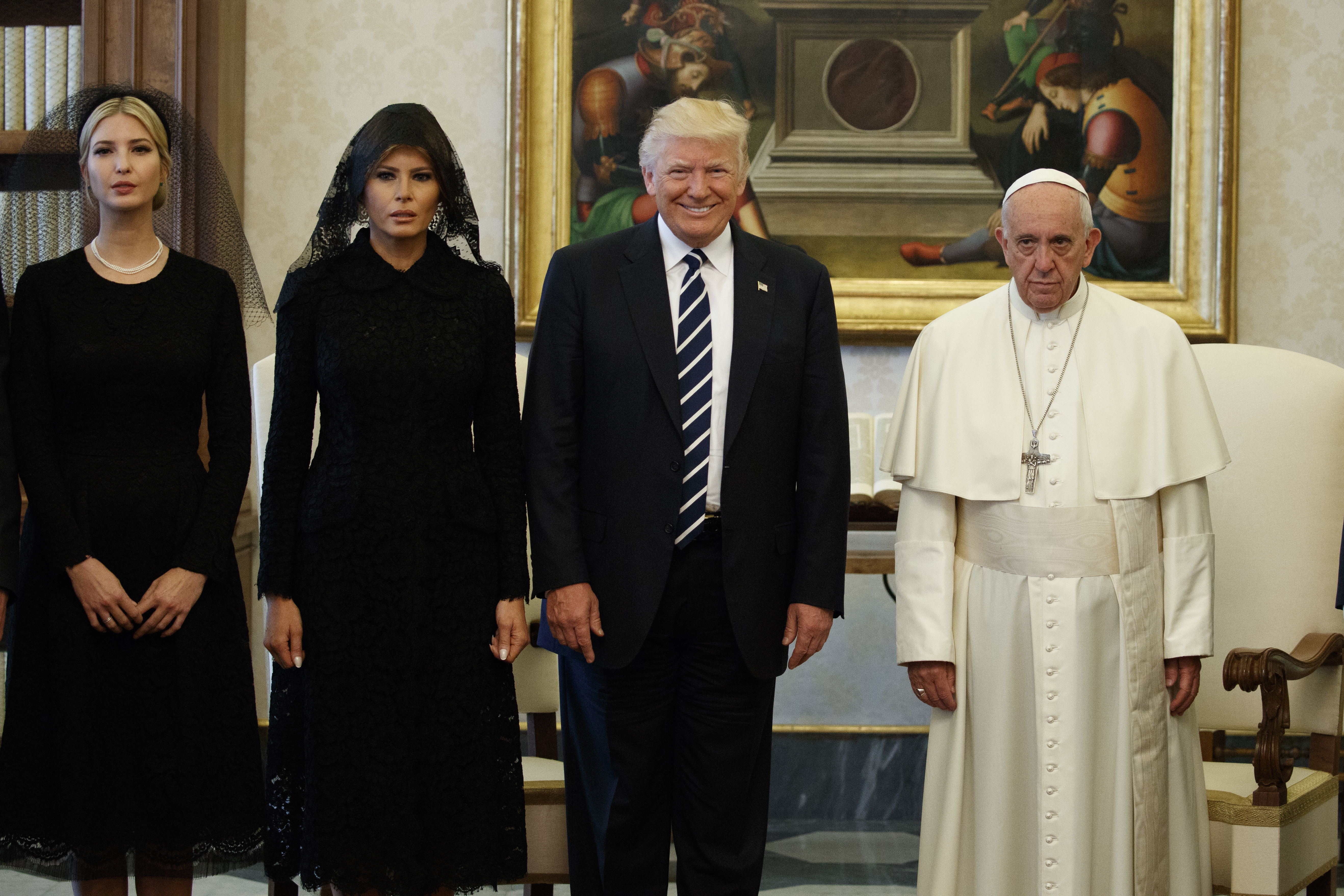 Ivanka Trump, First Lady Melania Trump, and President Donald Trump stand with Pope Francis.