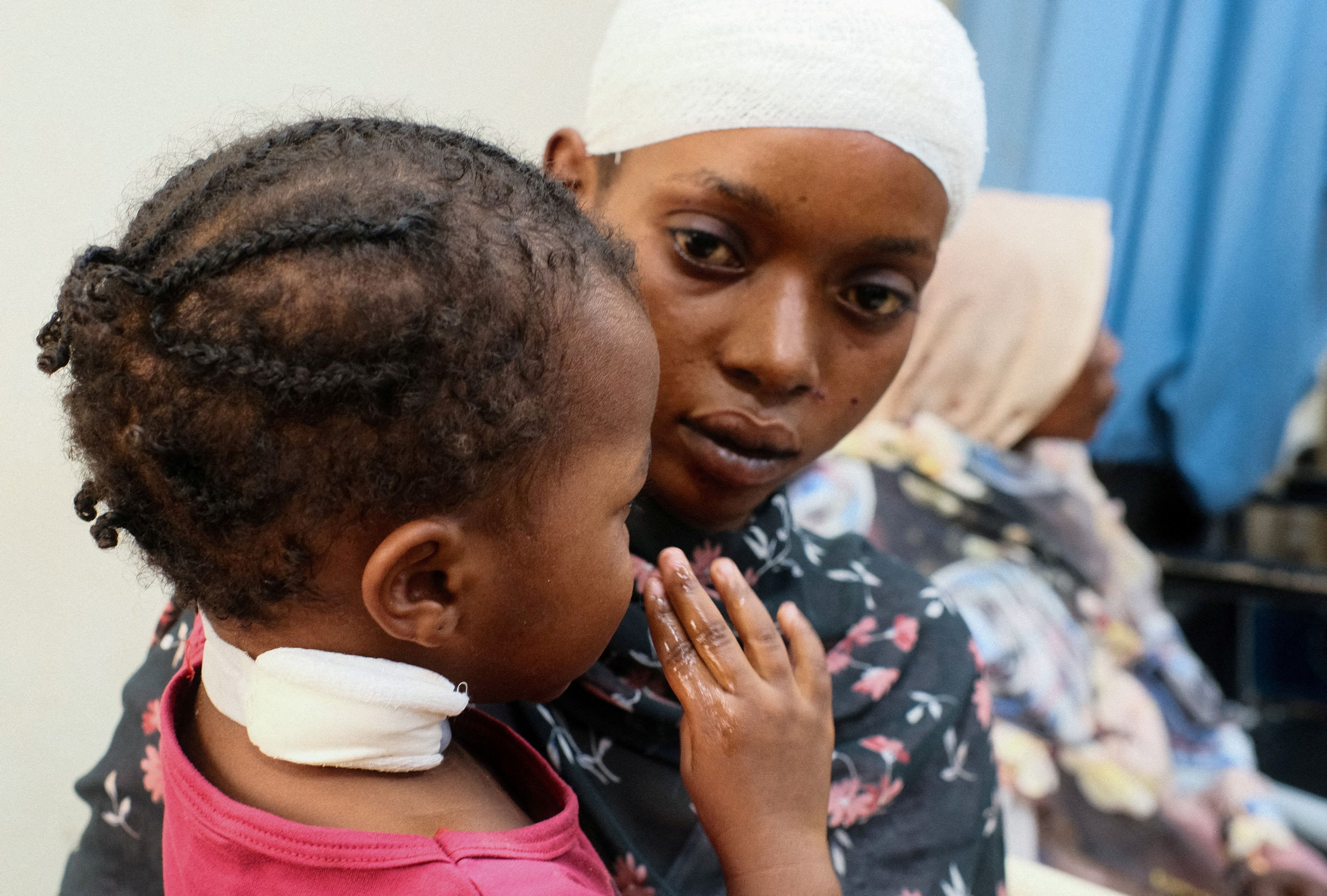 A woman and her daughter are treated at a hospital.