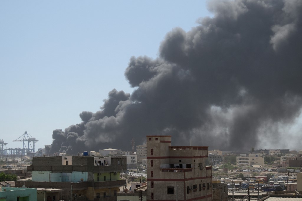 Smoke billows after a drone strike on the port of Port Sudan on May 6, 2025.