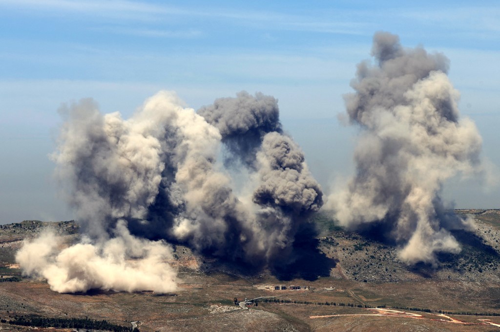 This pictures taken from the southern Lebanese area of Marjeyoun shows smoke billowing from the site of Israeli airstrikes on the hills of the southern Lebanese village of Nabatiyeh on May 8, 2025. [Rabih Daher/ AFP]