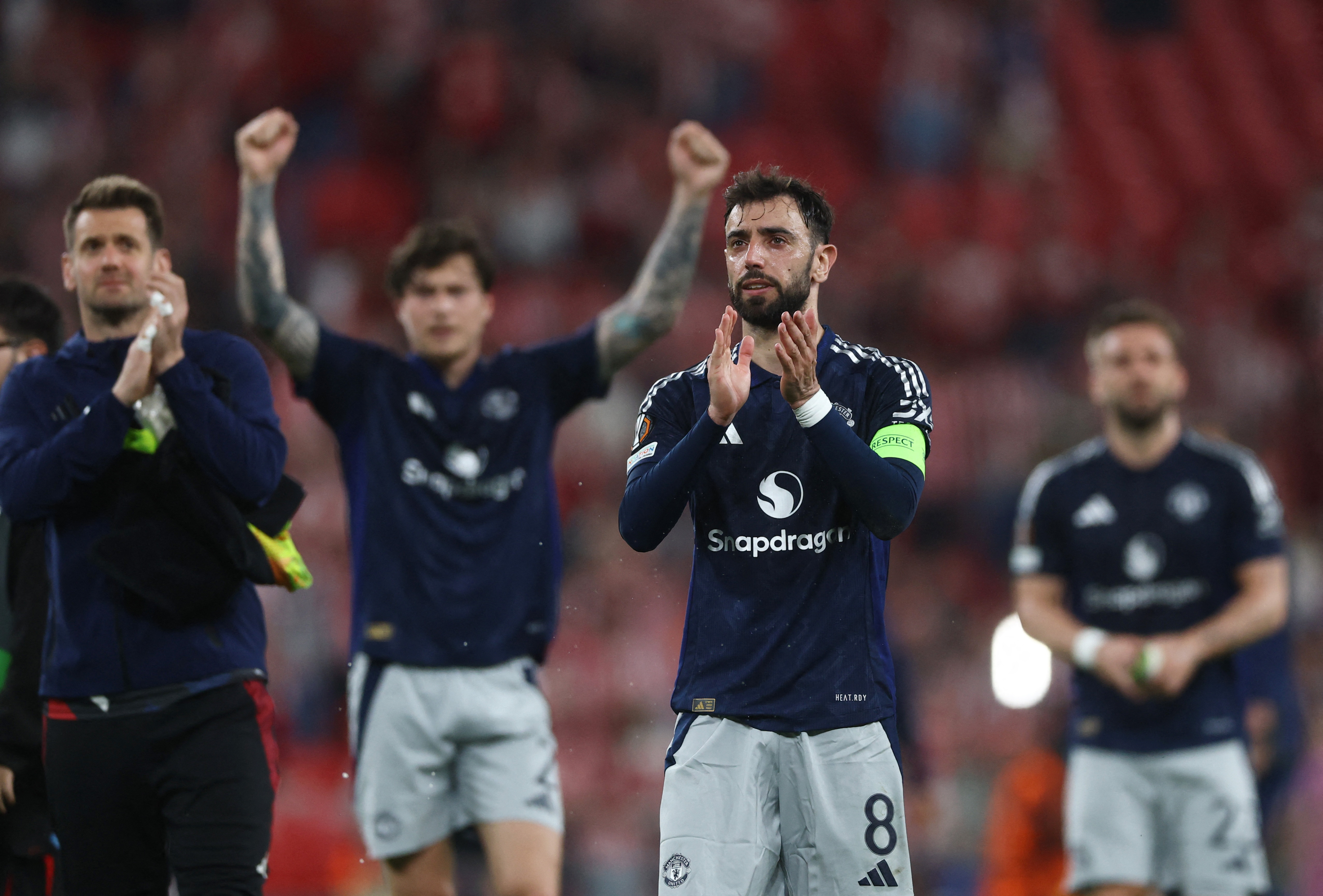 Manchester United's Bruno Fernandes applauds fans after the match [Lee Smith/Action Images via Reuters]