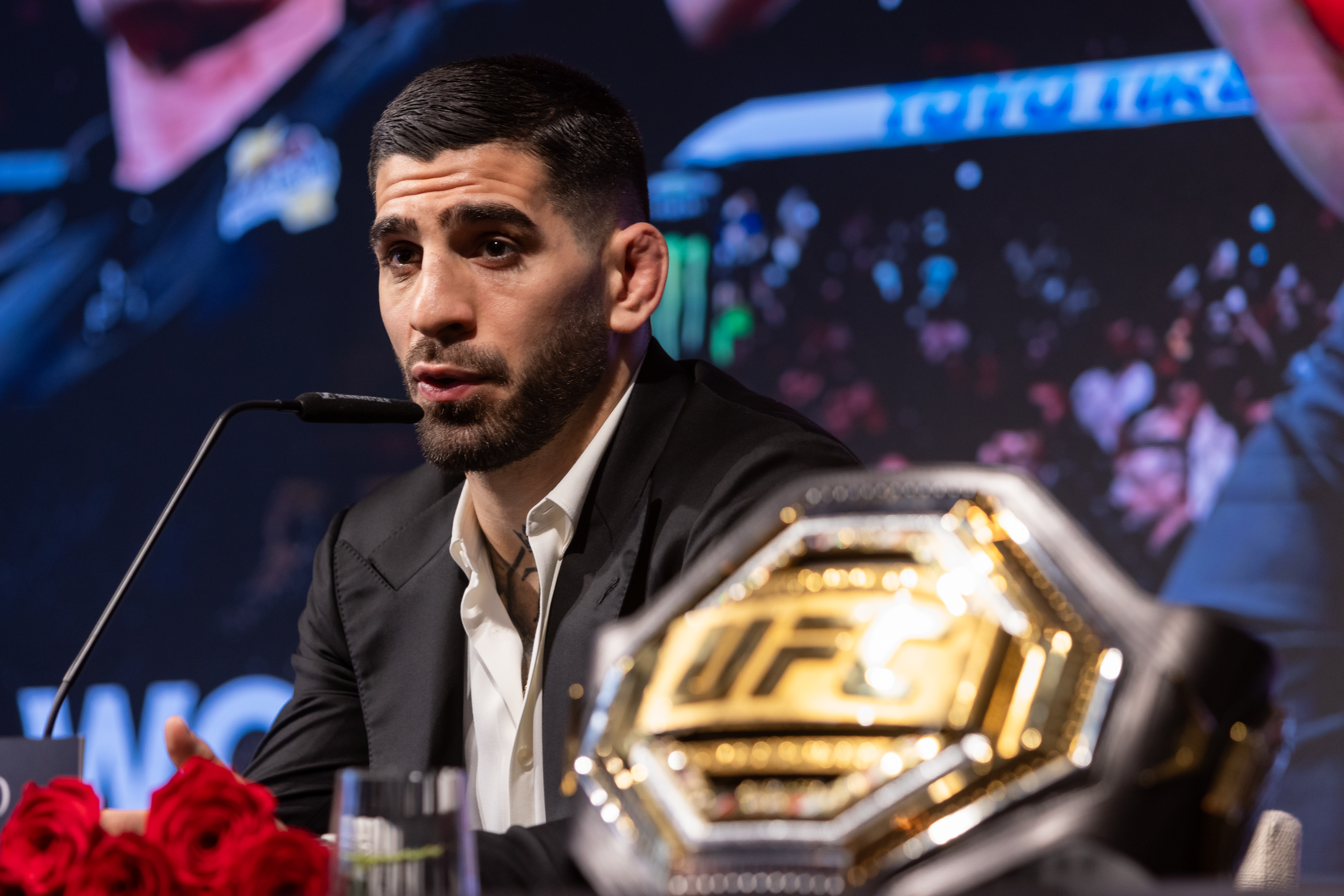 IIia Topuria reacts.