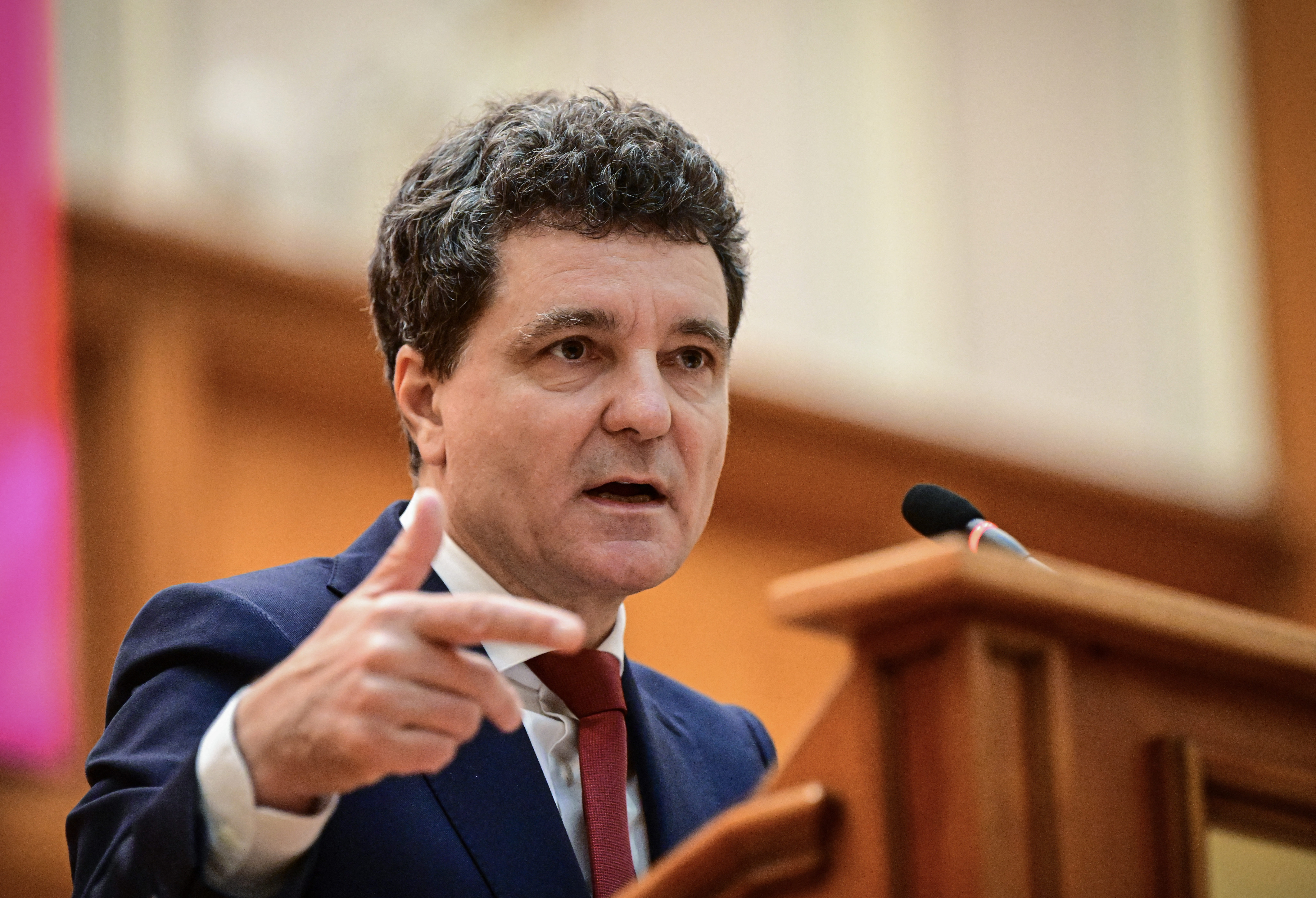 Romanian President-elect Nicusor Dan delivers his speech in the front of Patliament after his swearing-in ceremony at the Parliament Palace in Bucharest on May 26, 2025.