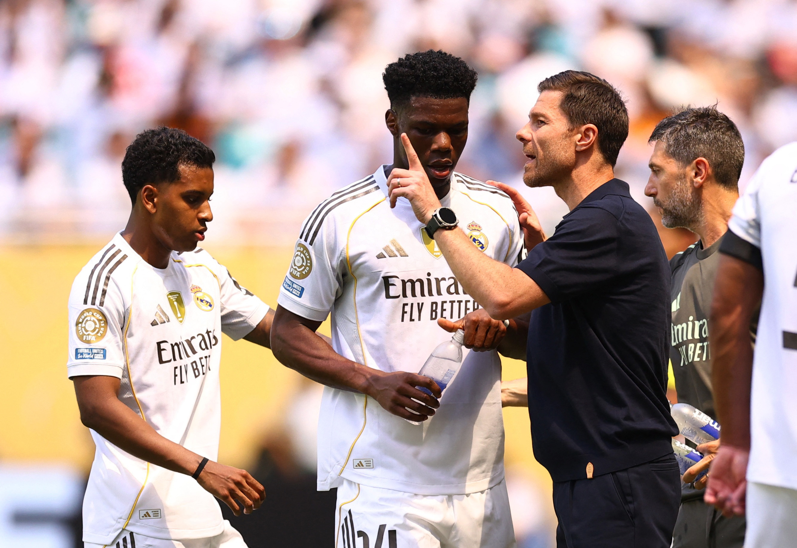 Real Madrid coach Xabi Alonso talks to Aurelien Tchouameni and Rodrygo