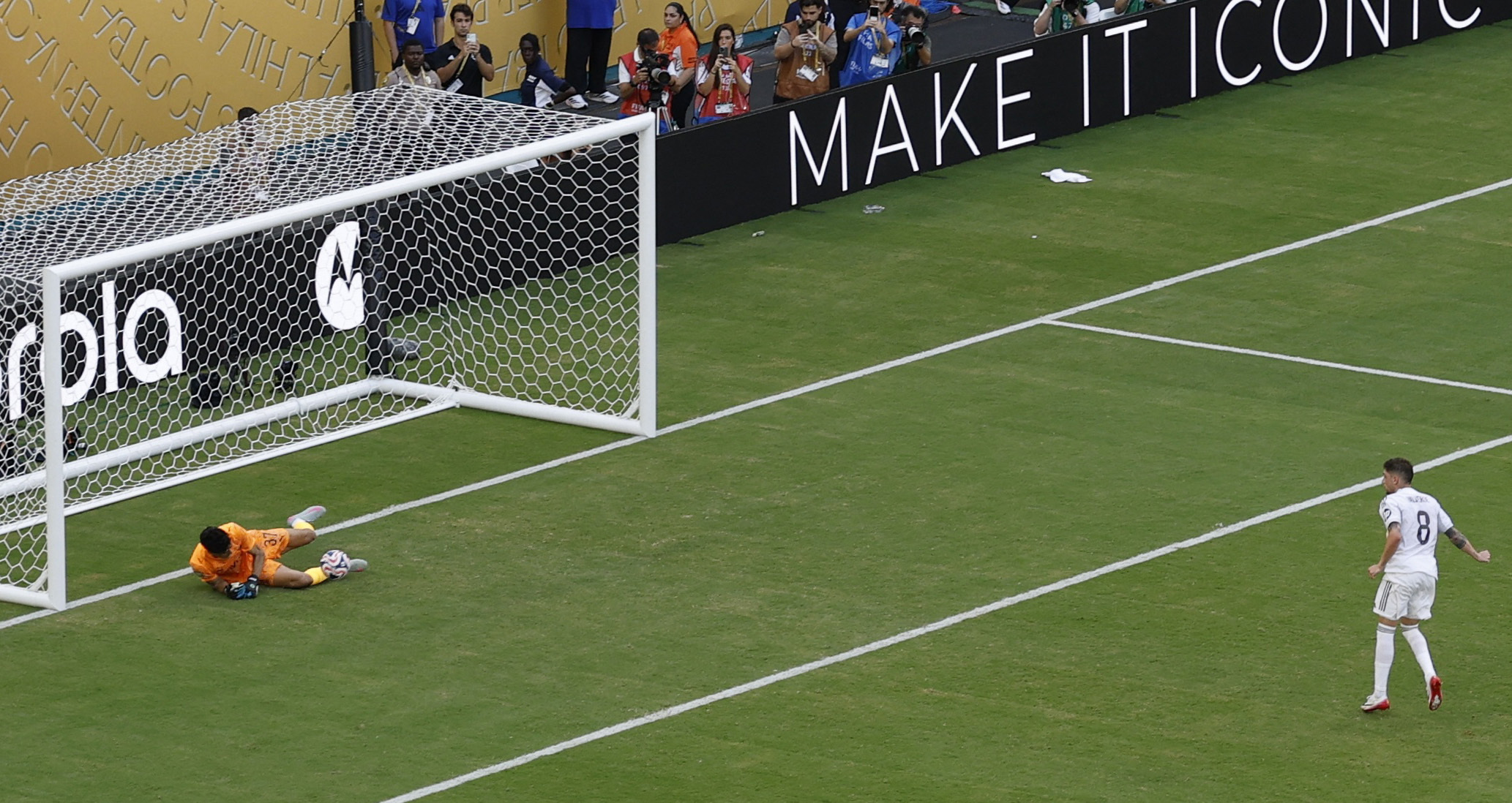 Al Hilal's Yassine Bounou saves a penalty from Real Madrid's Federico Valverde