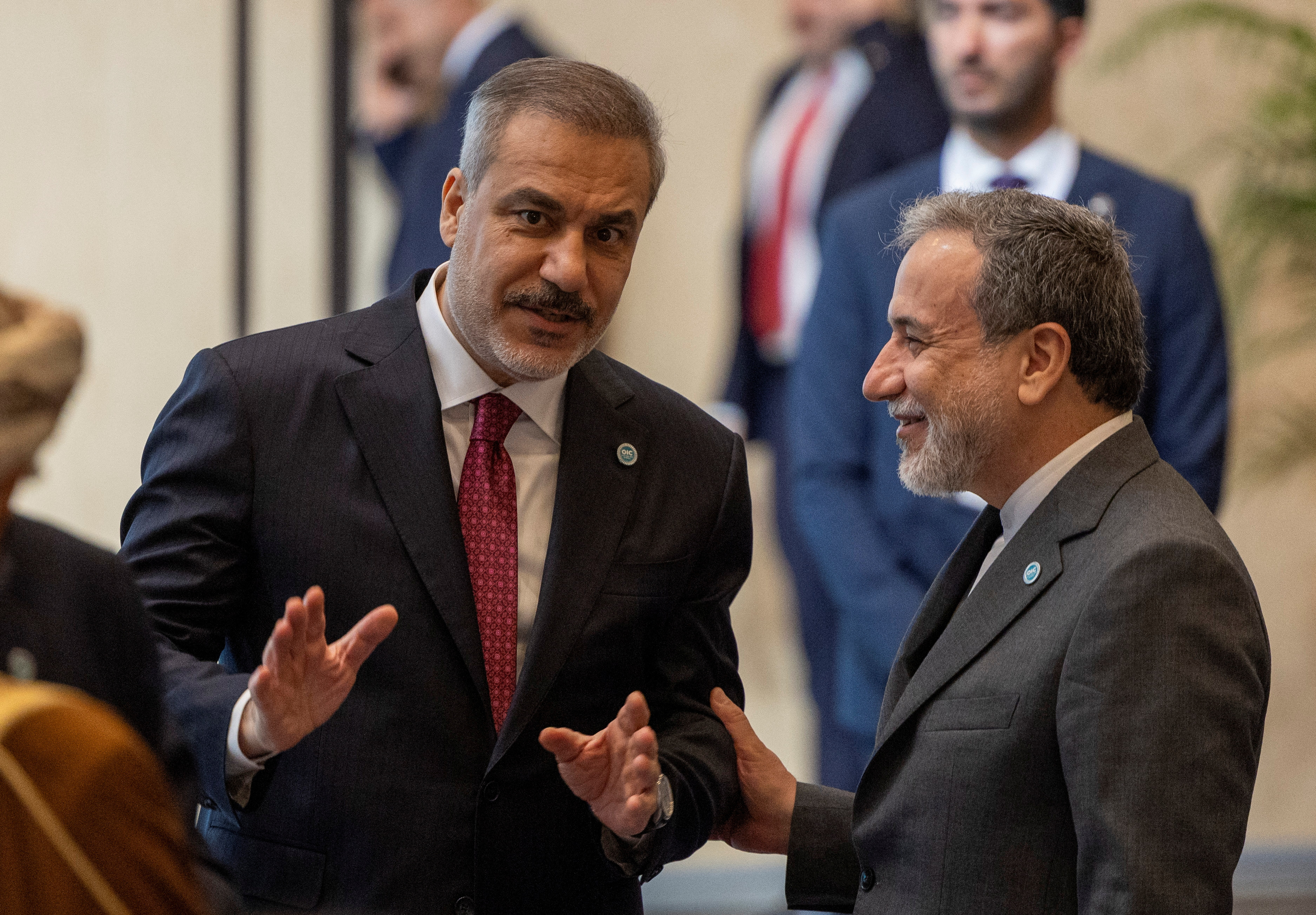 Iranian Foreign Minister Abbas Araghchi talks with Turkish Foreign Minister Hakan Fidan during the 51st Session of the Council of Foreign Ministers of the Organisation of Islamic Cooperation (OIC) in Istanbul, Turkey