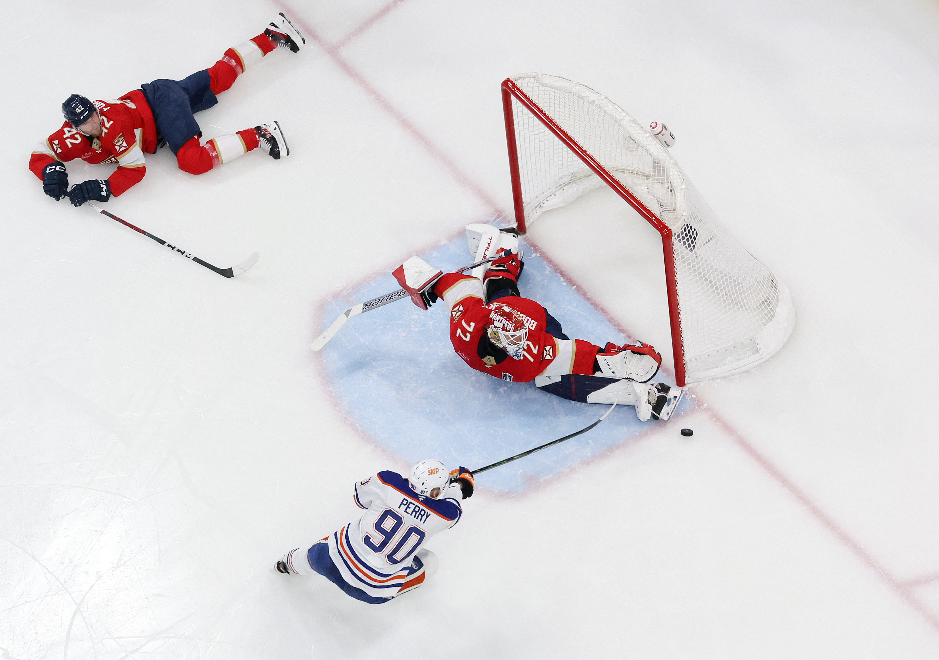 SUNRISE, FLORIDA - JUNE 17: Sergei Bobrovsky #72 of the Florida Panthers saves a shot from Corey Perry #90 of the Edmonton Oilers during the second period in Game Six of the 2025 Stanley Cup Final at Amerant Bank Arena on June 17, 2025 in Sunrise, Florida. Christian Petersen/Getty Images/AFP (Photo by Christian Petersen / GETTY IMAGES NORTH AMERICA / Getty Images via AFP)
