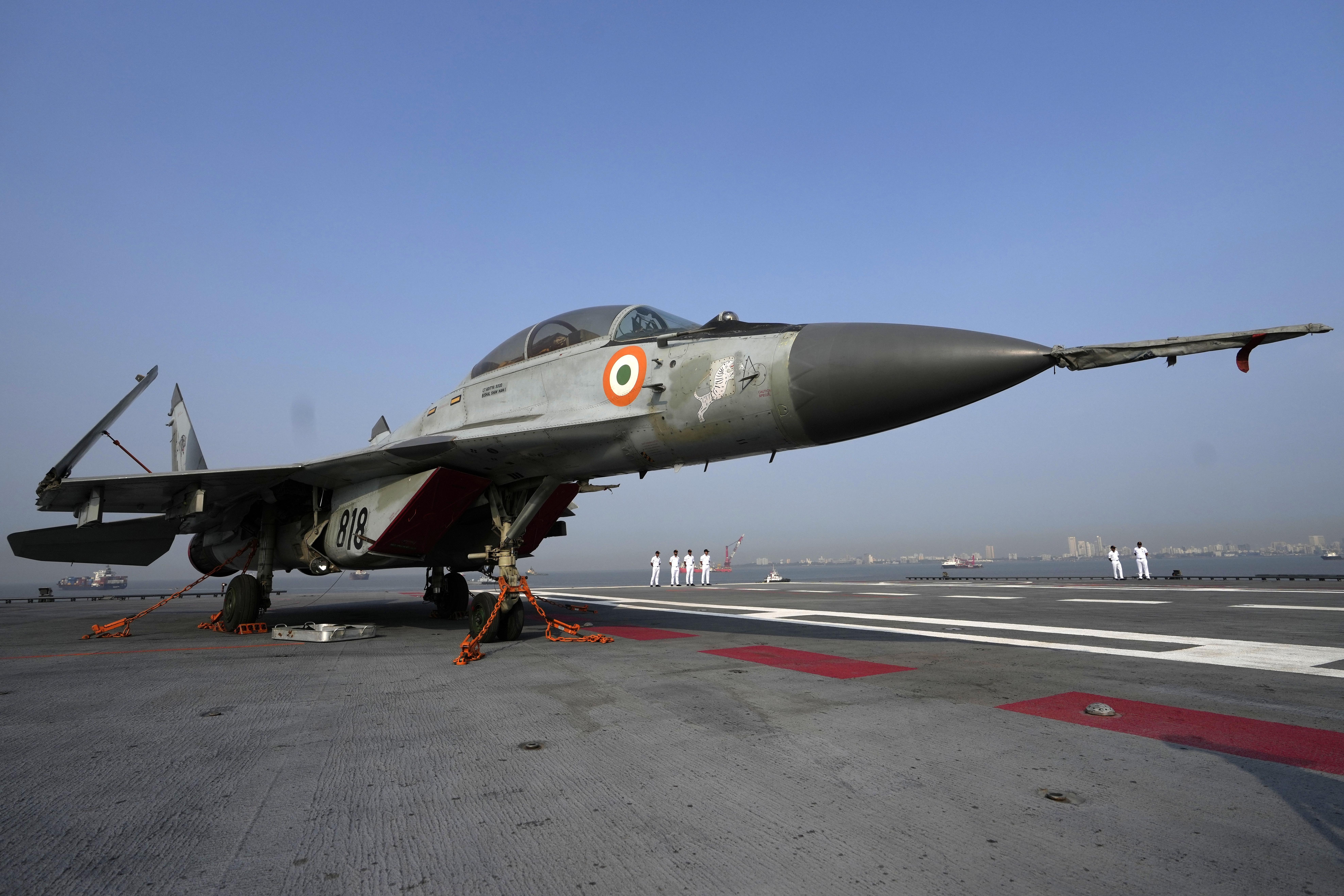 A MiG-29K aircraft sits on the deck of India&#039;s first indigenous aircraft carrier, the INS Vikrant, in Mumbai, India, Friday, March 10, 2023 [Rajanish Kakade/AP Photo]