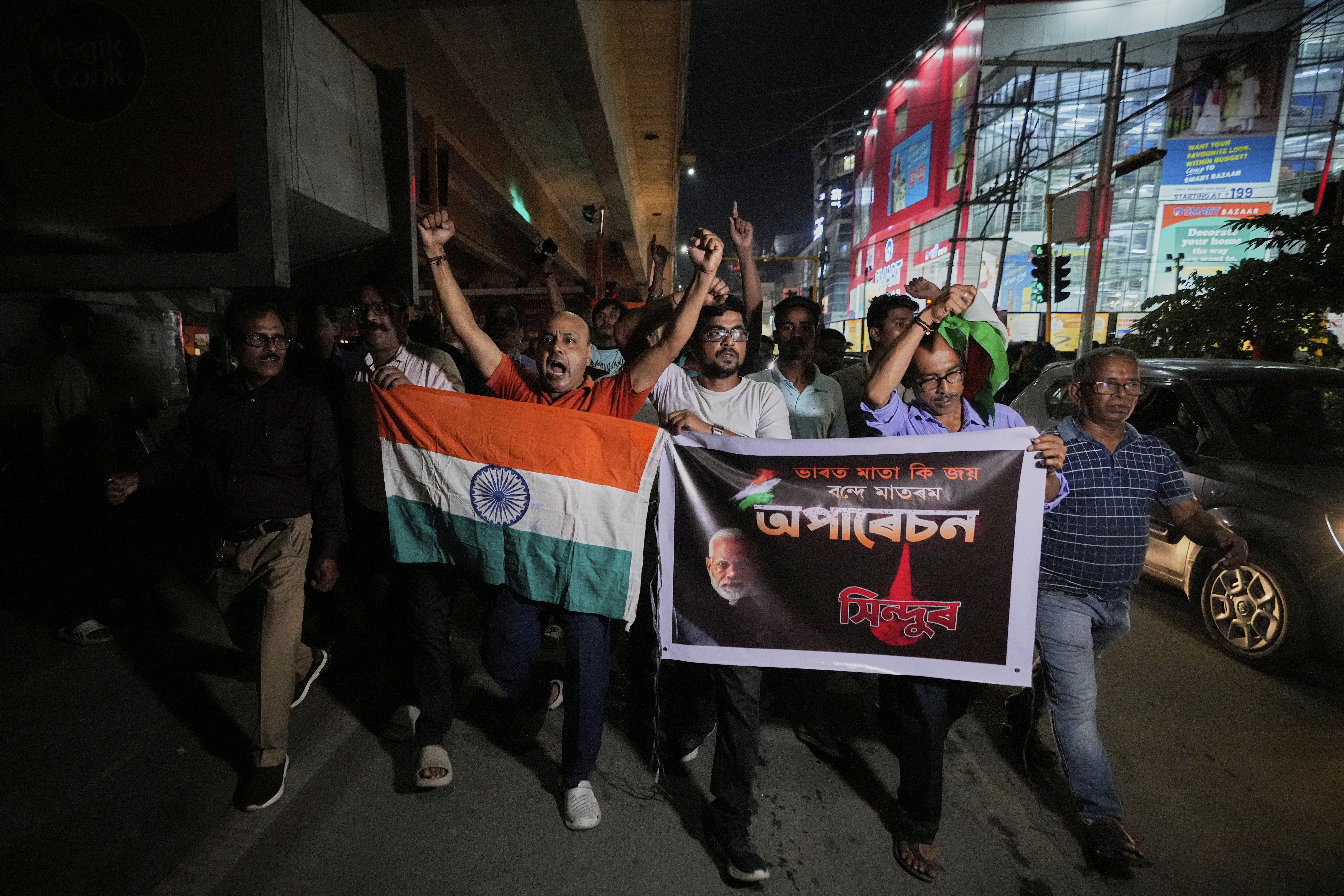 People holding Indian national flags rally's in support of the Indian Army as they celebrate the success of 'Operation Sindoor', in Guwahati, India, Thursday, May 8, 2025.