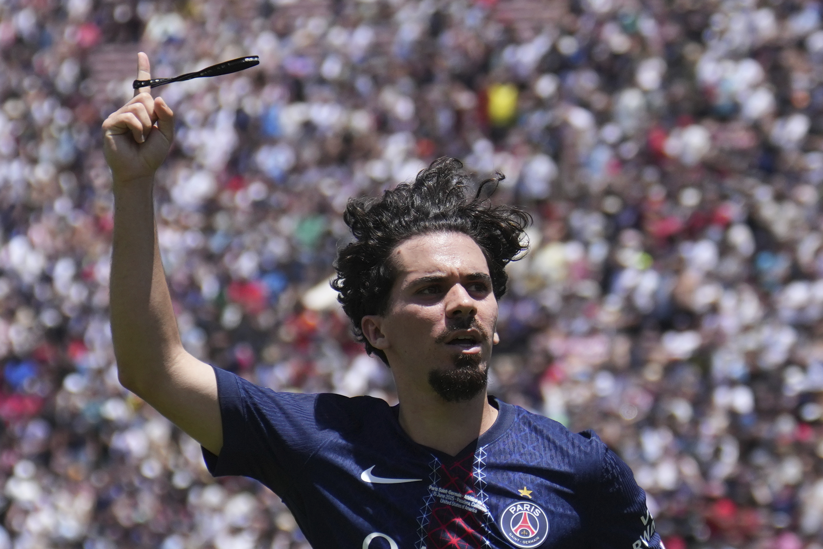 Paris Saint-Germain's Vitinha celebrates scoring his side's second goal