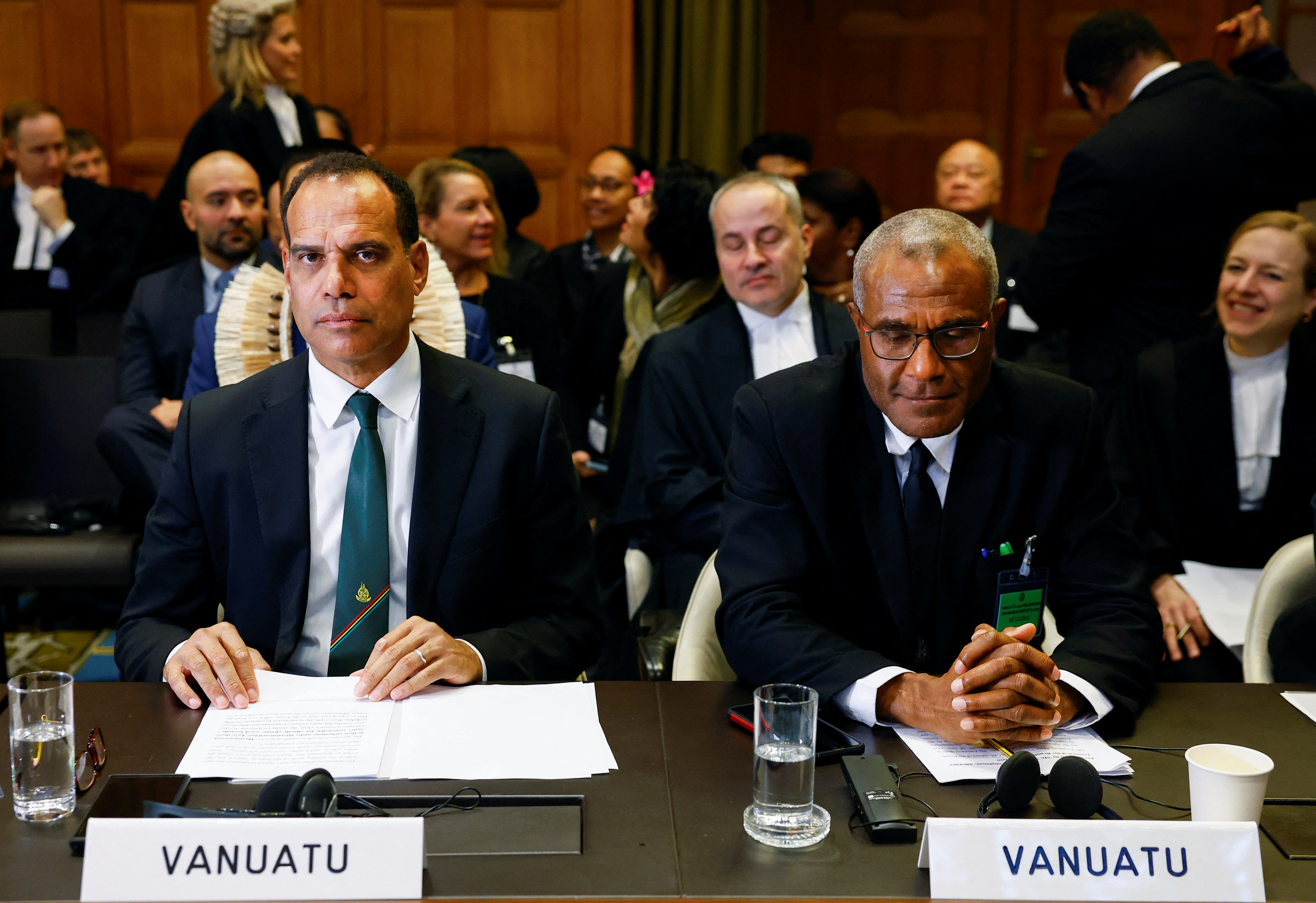Ralph Regenvanu, Special Envoy for Climate Change and Environment for the Republic of Vanuatu and Arnold Kiel Loughman, Attorney-General for the Republic of Vanuatu attend United Nations' top court International Court of Justice (ICJ) public hearings in an advisory opinion case that may become a reference point in defining countries' legal obligations to fight climate change, in The Hague, Netherlands, December 2 2024. REUTERS/Piroschka van de Wouw