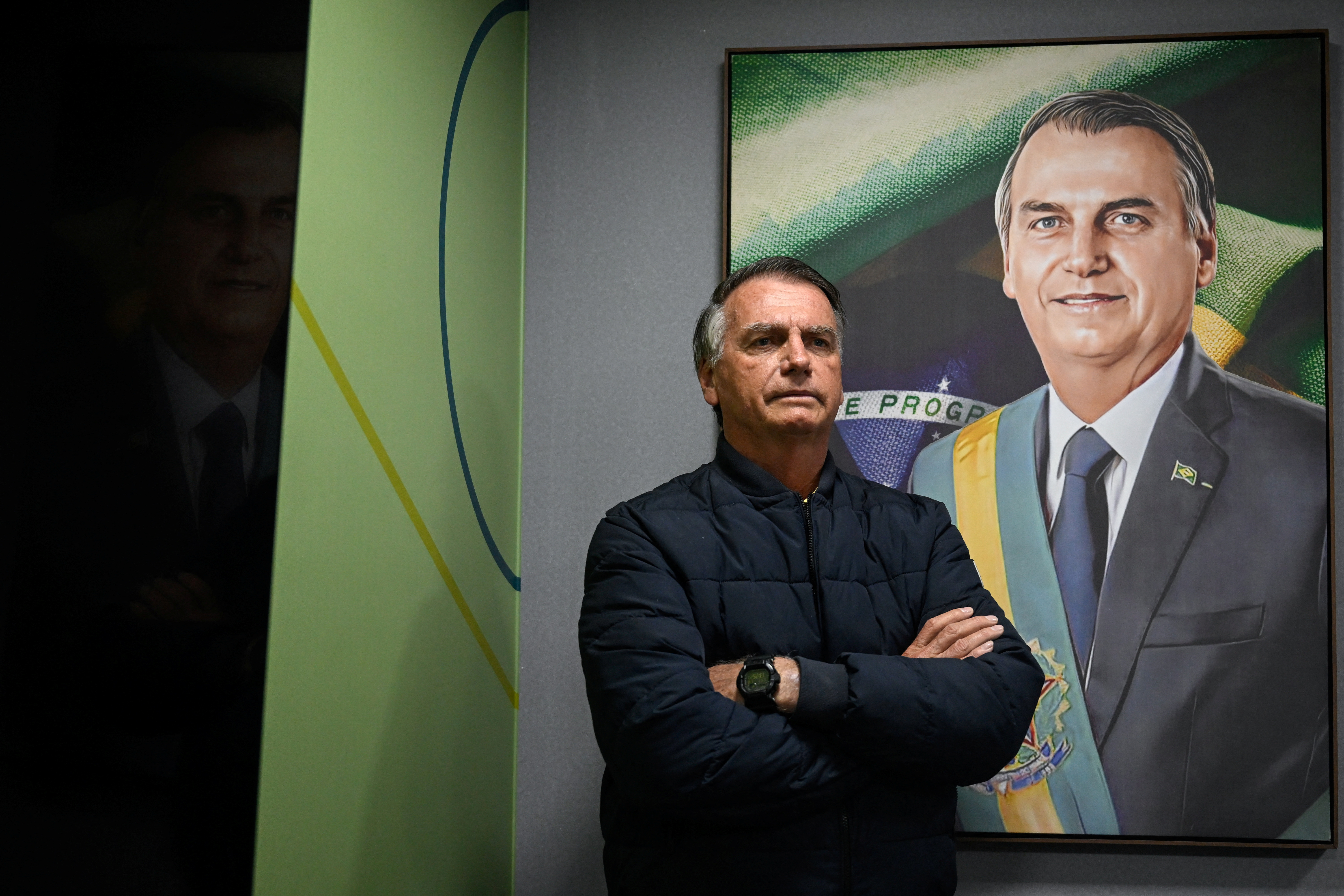 Former Brazilian President Jair Bolsonaro poses for a picture after an interview with Reuters in Brasilia, Brazil, July 18, 2025. REUTERS/Mateus Bonomi