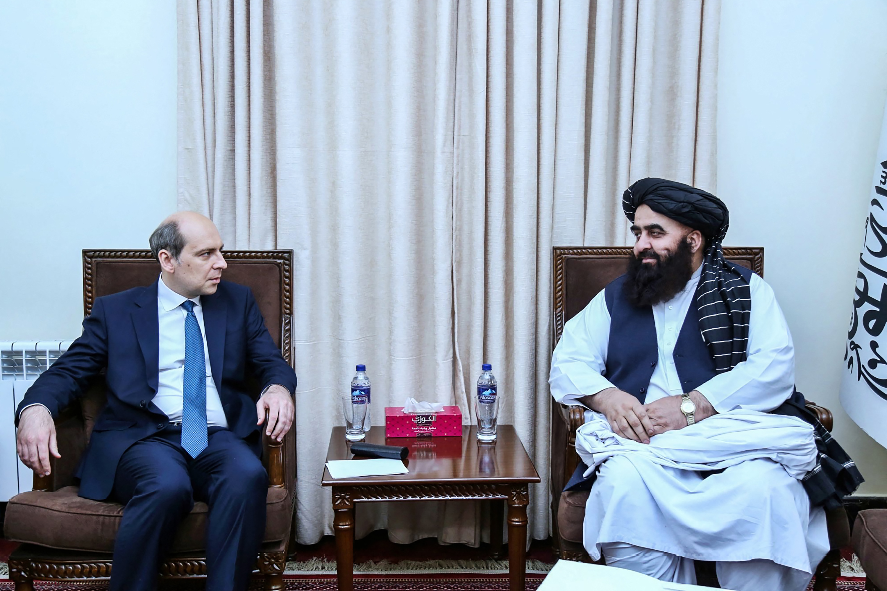 Dmitry Zhirnov (L), Russia's ambassador to Afghanistan, meeting with Amir Khan Muttaqi, Afghanistan's Foreign Minister