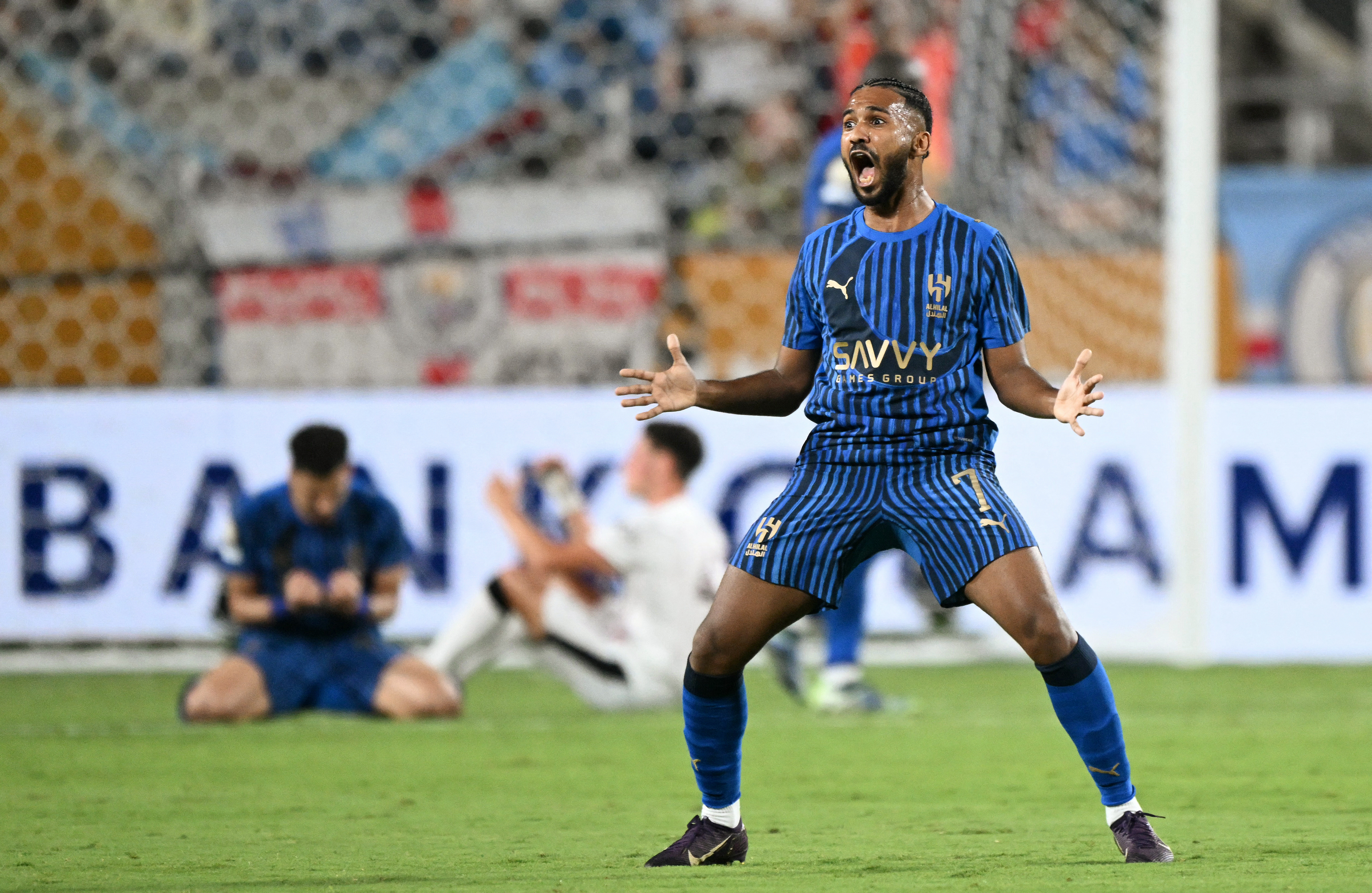 Al Hilal's Saudi midfielder #07 Khalid Al-Ghannam celebrates after winning the FIFA Club World Cup 2025 round of 16 football match between England's Manchester City and Saudi's Al-Hilal at the Camping World stadium in Orlando on June 30, 2025. (Photo by CHANDAN KHANNA / AFP)