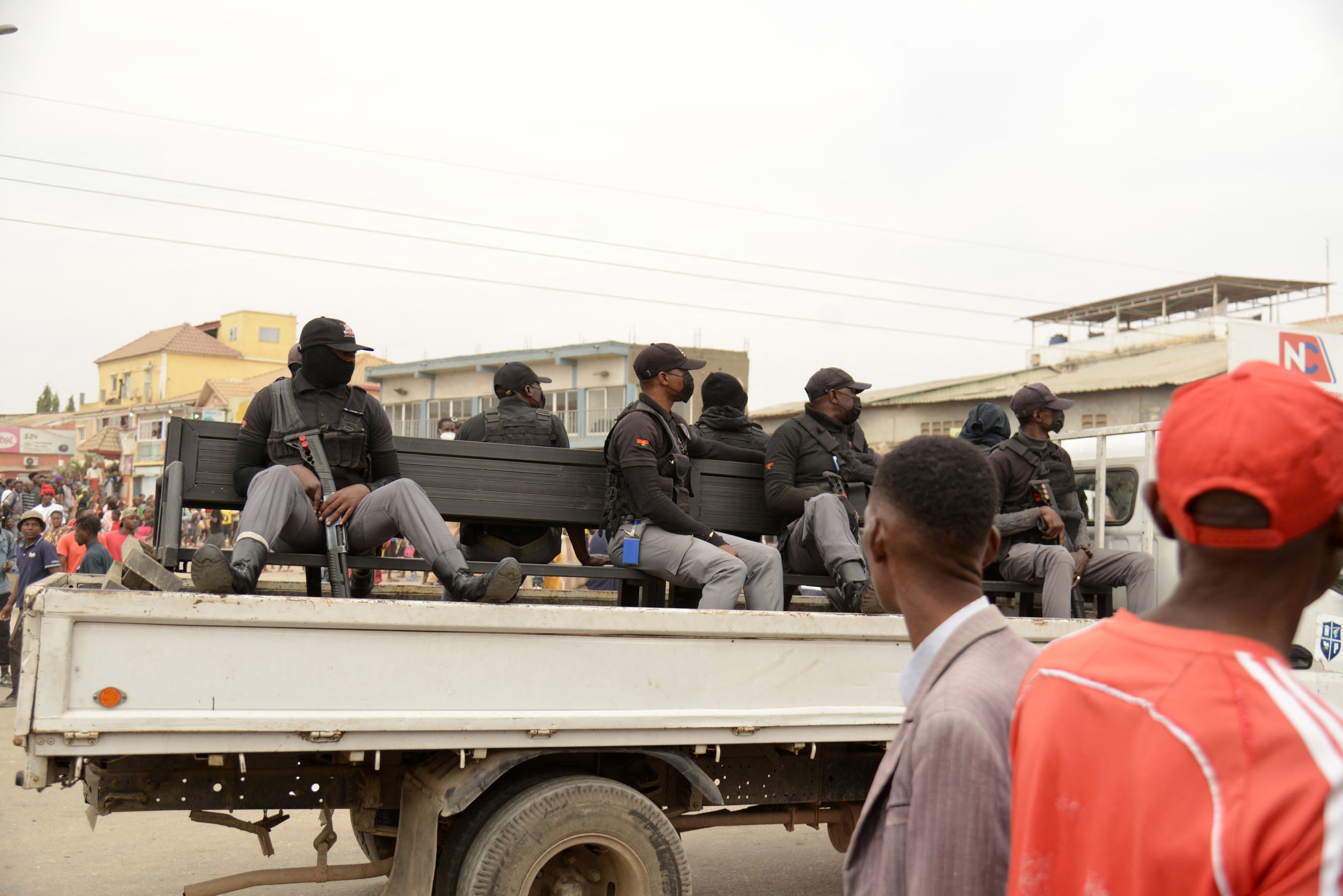 Members of the Angola National Police patrols as looting erupted in the Kalemba 2 district of Luanda on July 28, 2025 during a general strike in the taxi sector declared for three days to protest against the rising prices of fuel.