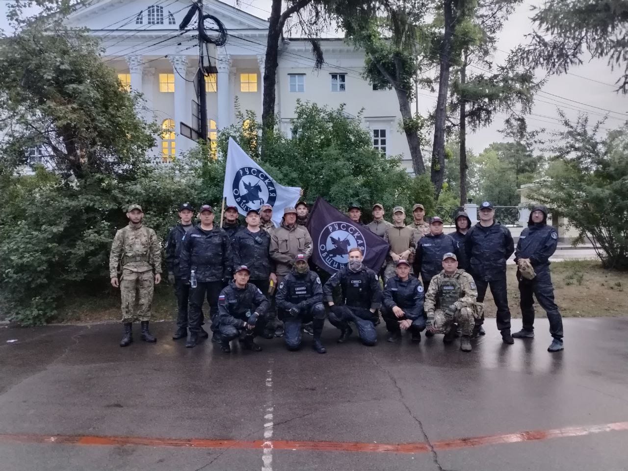 Members of the Russian Community pose in their uniforms.