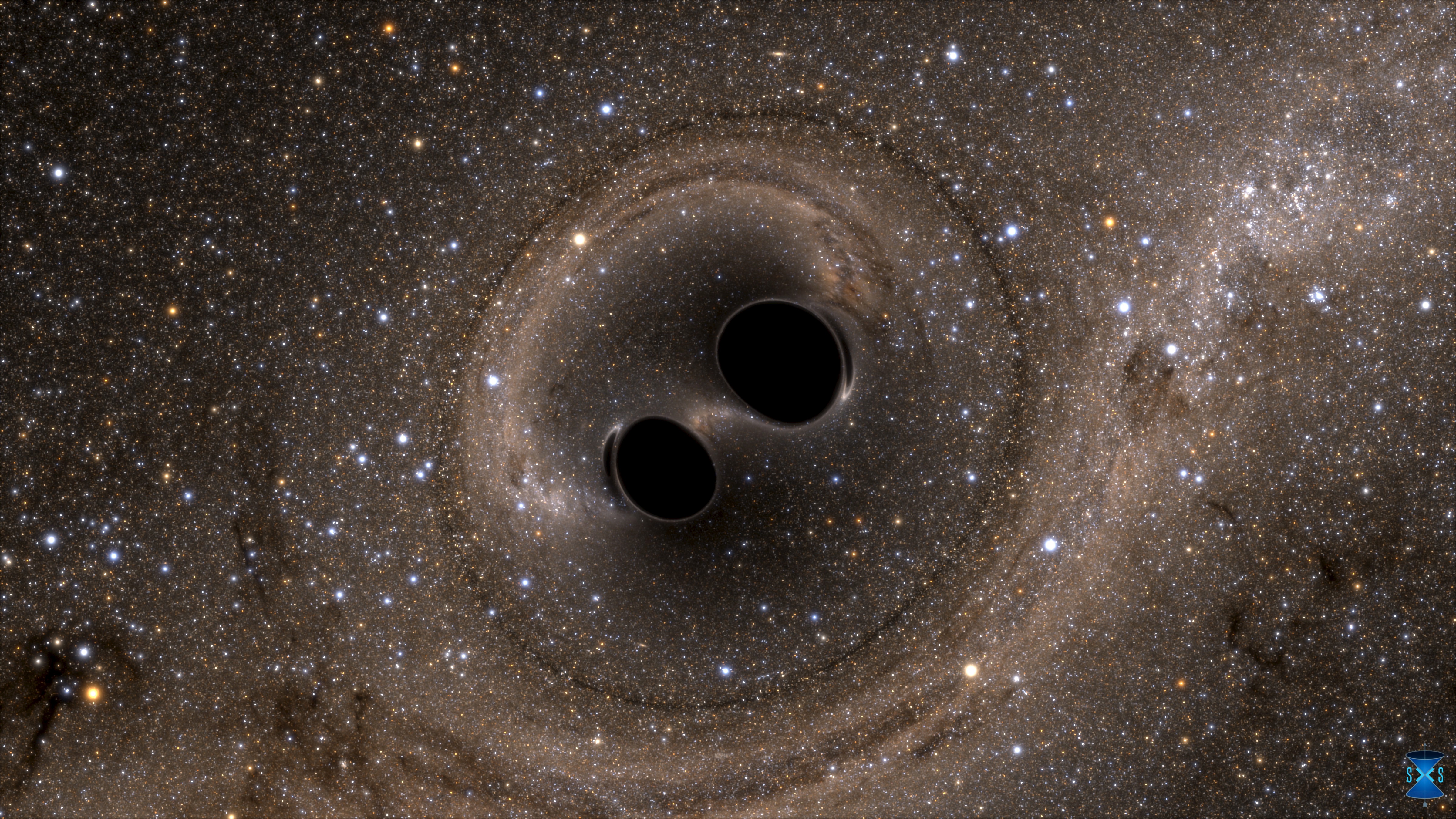 The collision of two black holes - a tremendously powerful event detected for the first time ever by the Laser Interferometer Gravitational-Wave Observatory, or LIGO - is seen in this still image from a computer simulation released in Washington February 11, 2016.