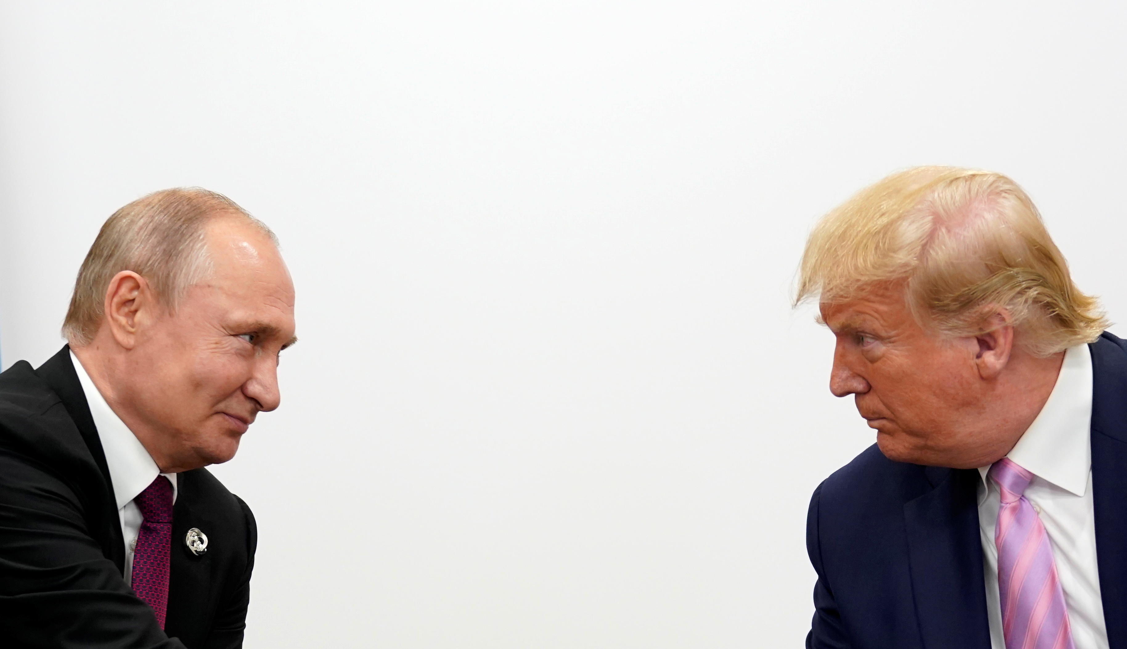 U.S. President Donald Trump and Russian President Vladimir Putin hold a bilateral meeting at the G20 leaders summit in Osaka, Japan June 28, 2019. REUTERS/Kevin Lamarque