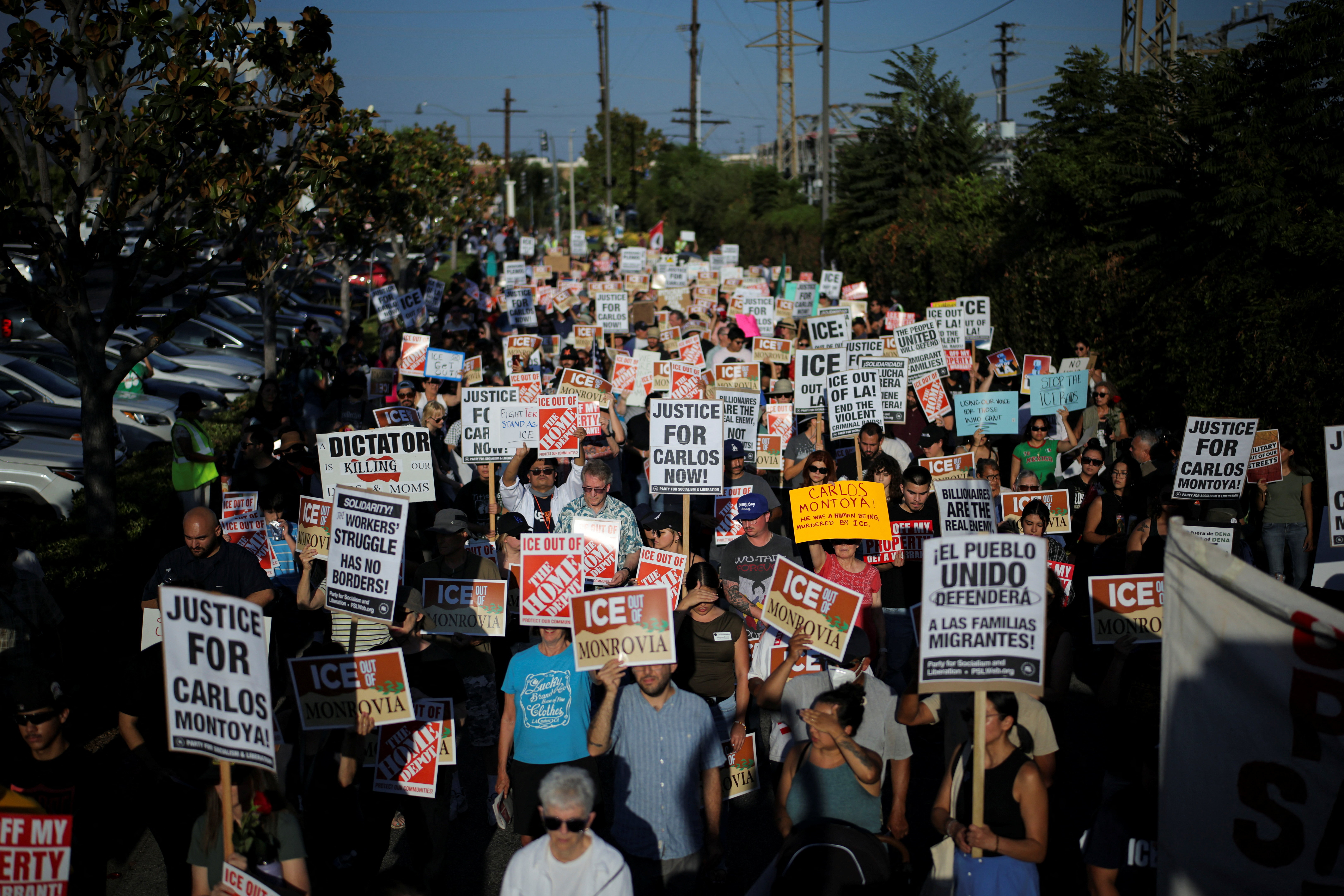 People march during a vigil commemorating day laborer who died in California while trying to escape the presence of federal immigration enforcement agents during a raid at a Home Depot in August. The Trump administration has been cracking down on immigration in many forms since taking office. [Daniel Cole/Reuters]