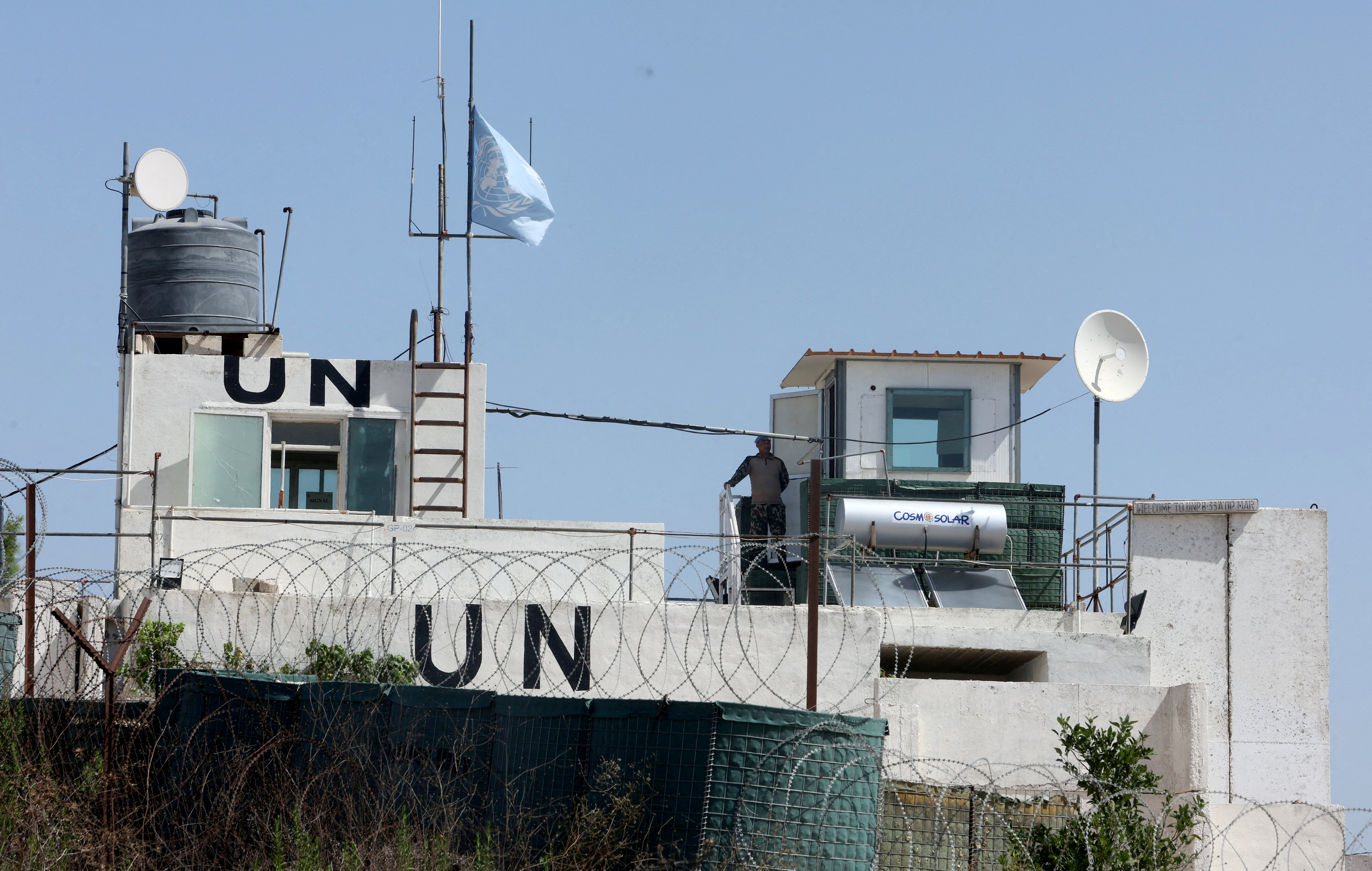 FILE PHOTO: A U.N. peacekeeper of the United Nations Interim Force in Lebanon (UNIFIL) stands at his post in the village of Markaba, near the border with Israel, southern Lebanon, August 31, 2023. REUTERS/Aziz Taher/File Photo