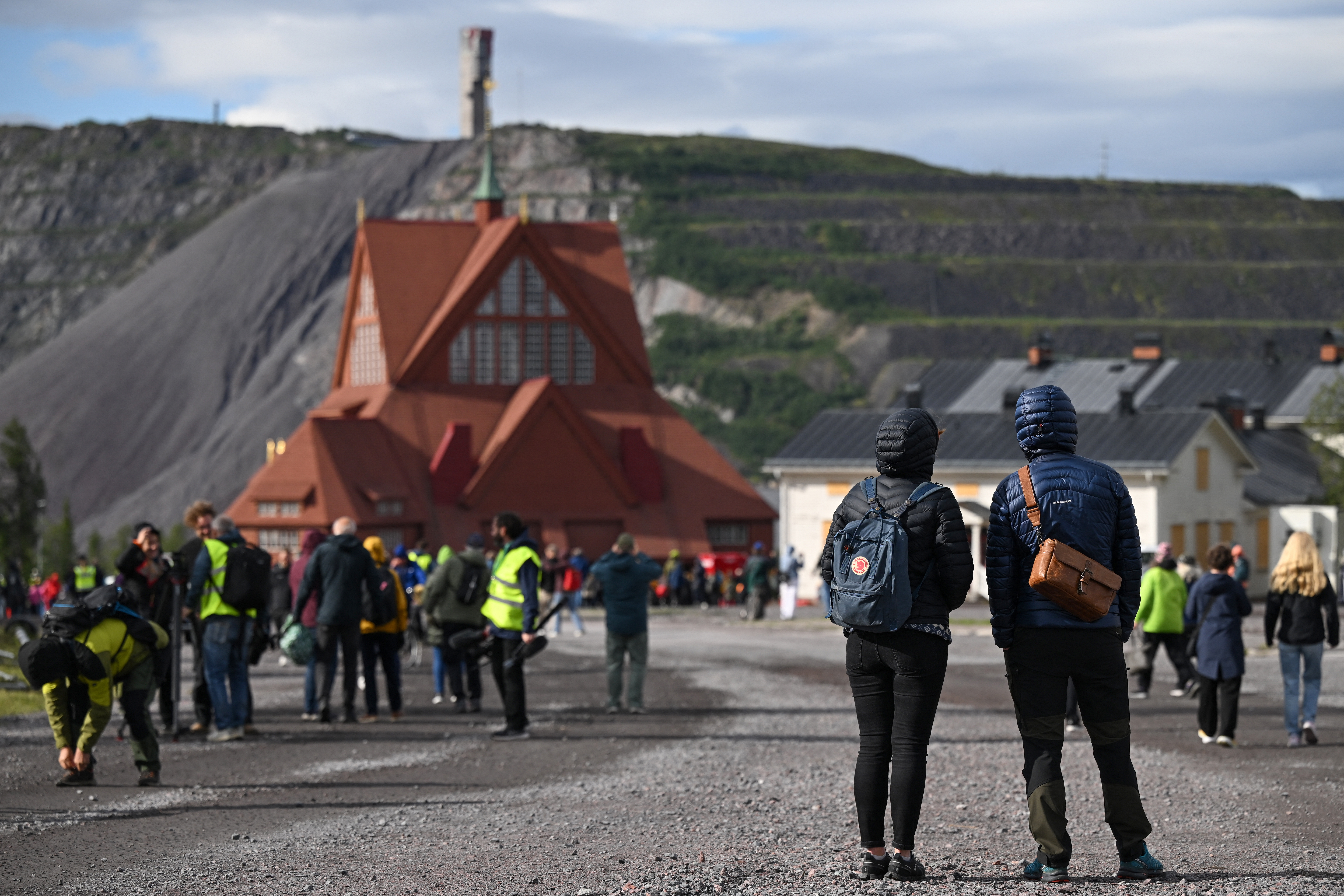 People gather to watch the moving of the wooden Kiruna Church.