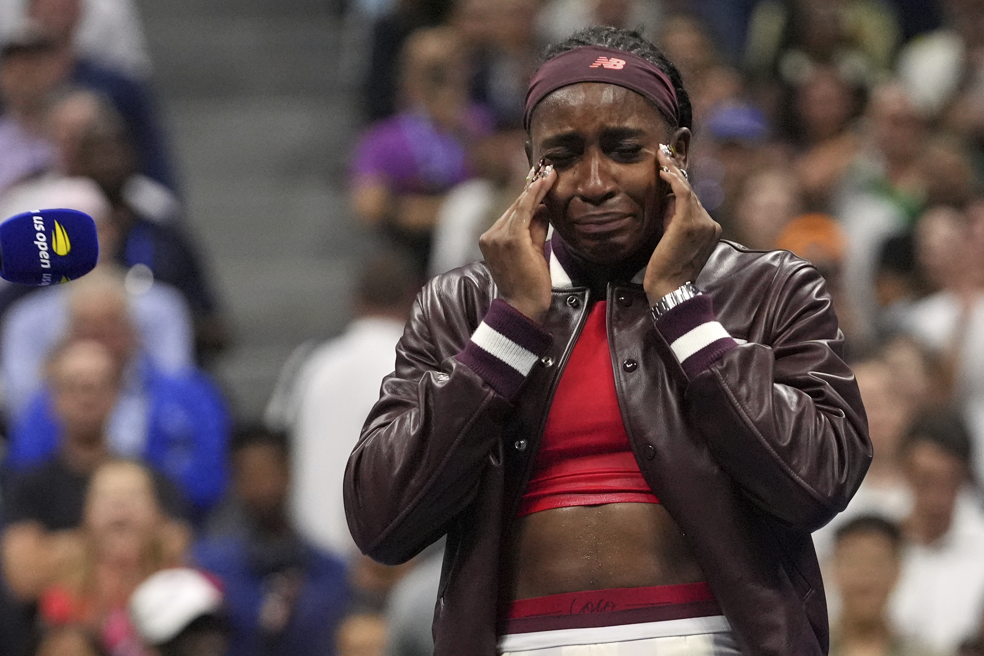 Coco Gauff, of the United States, cries after defeating Donna Vekic, of Croatia, during the second round of the US Open tennis championships