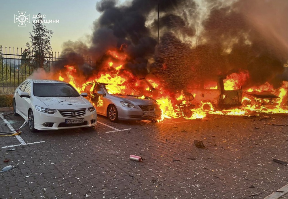 A handout picture made available by the State Emergency Service shows vehicles burning at the site of a drone strike of a parking near a residential building in Kyiv, Ukraine, overnight 20 September 2025, amid the ongoing Russian invasion. At least three people died and dozens were injured after an overnight Russian combined attack around Ukraine with about 580 shock-drones and 40 missiles of different types, according to the State Emergency Service report. EPA/STATE EMERGENCY SERVICE HANDOUT HANDOUT EDITORIAL USE ONLY/NO SALES