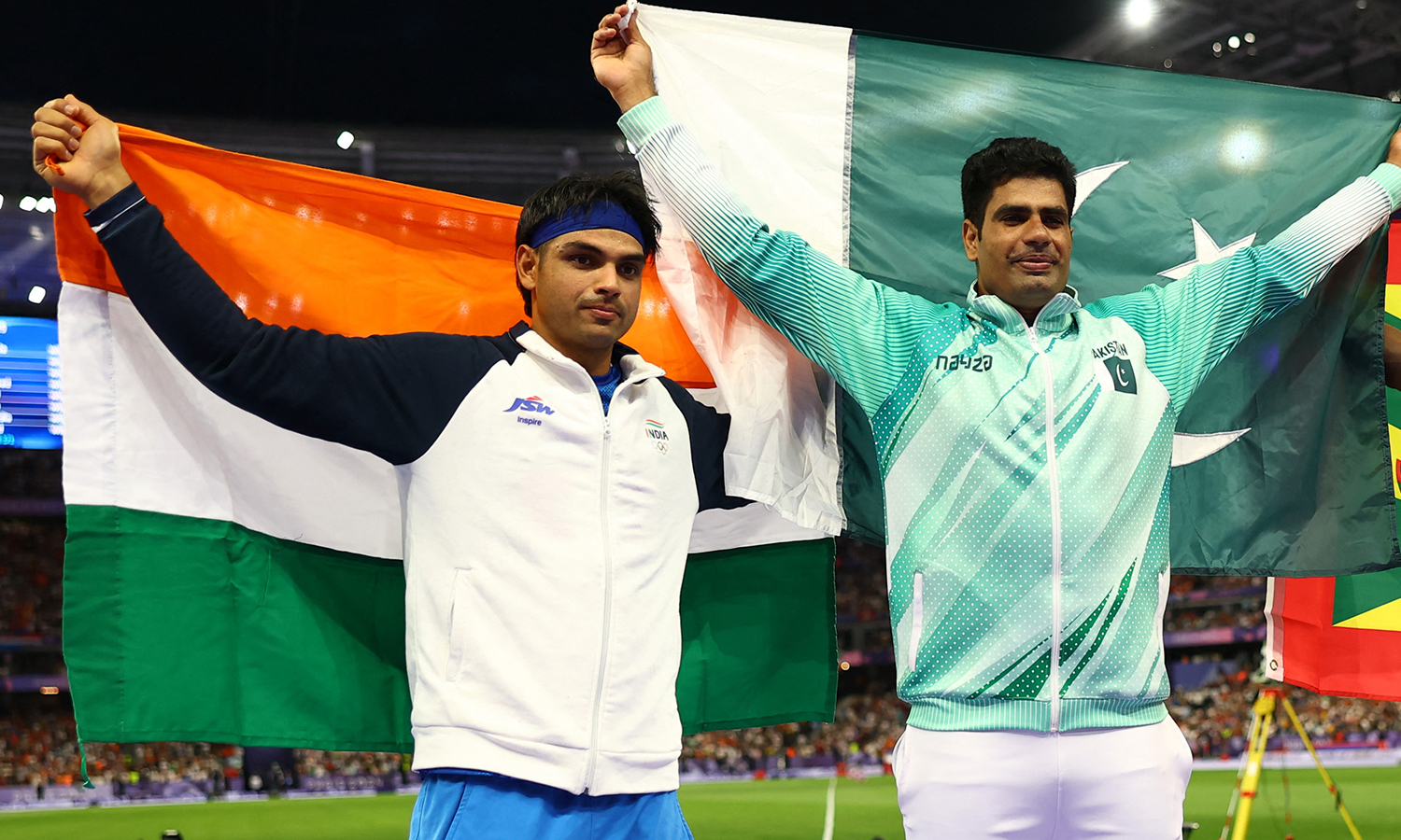 Arshad Nadeem, right, and Neeraj Chopra last competed against each other at the Paris Olympics 2024 on August 8, 2024 [File: Kai Pfaffenbach/Reuters]