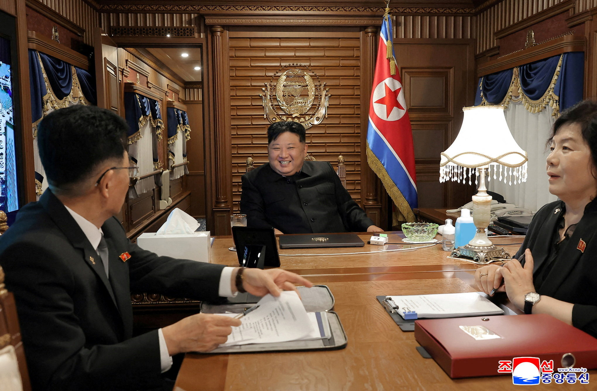 North Korean leader Kim Jong Un travels by train with group of staff.