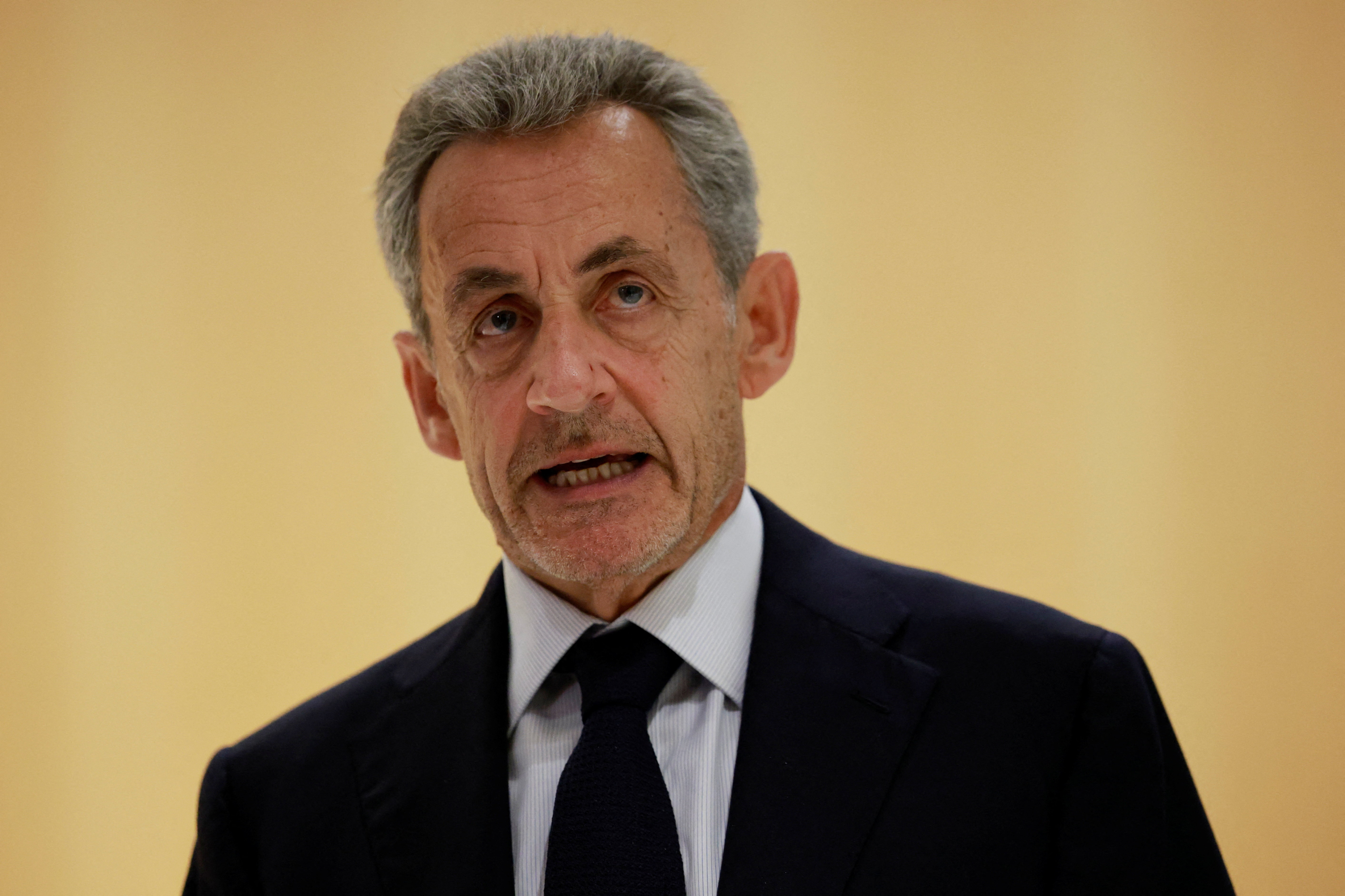 Former French President Nicolas Sarkozy speaks to journalists after the verdict is returned in his trial at the Paris Criminal Court, in Paris, France, on September 25, 2025 [Stephanie Lecocq/Reuters]