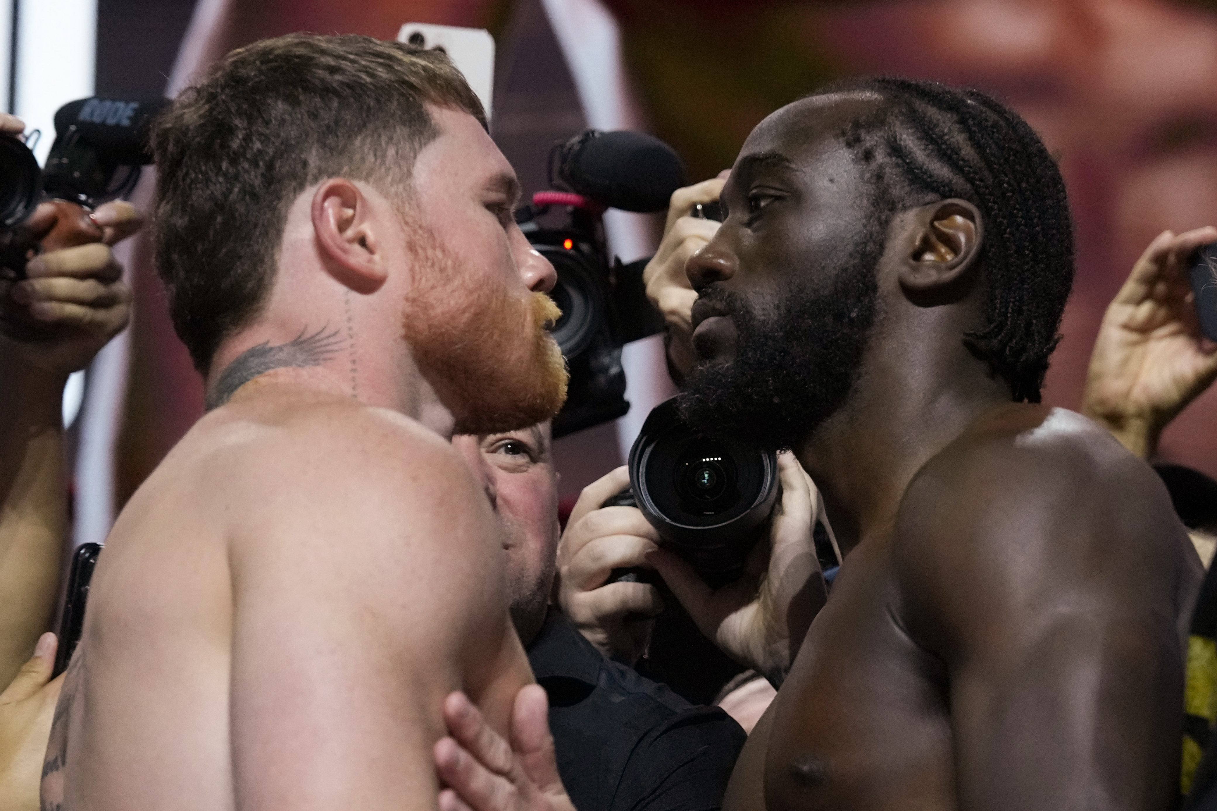 Canelo Alvarez and Terence Crawford face-off.