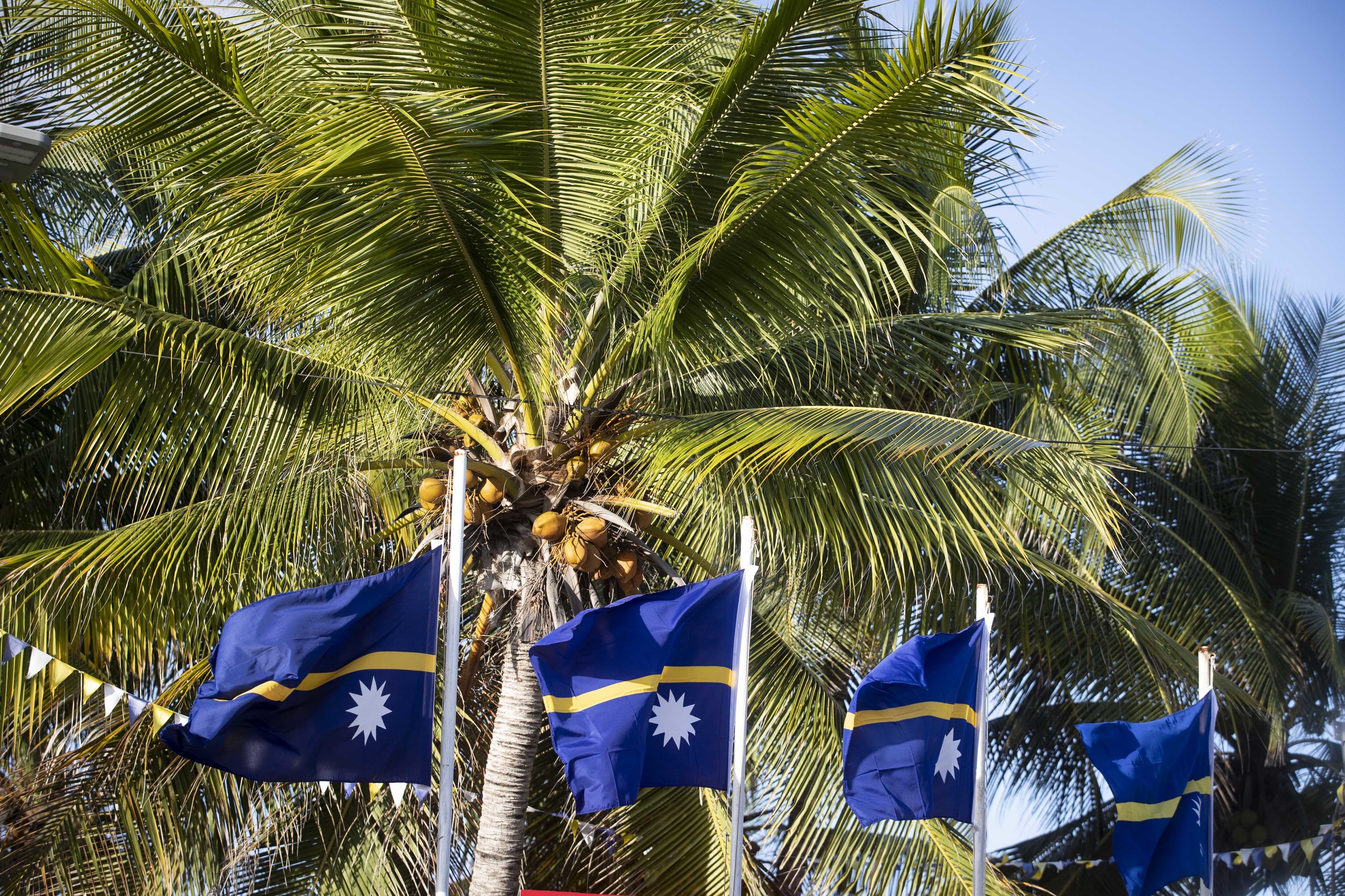 FILE - This shows national flags in Nauru for the Pacific Islands Forum on the tiny Pacific nation of Nauru, on Sept. 3, 2018. The Pacific Island nation of Nauru says it is switching diplomatic recognition from Taiwan to China. The move on Monday, Jan. 15, 2024 leaves Taiwan with 12 diplomatic allies around the world. (Jason Oxenham/Pool Photo via AP, File)