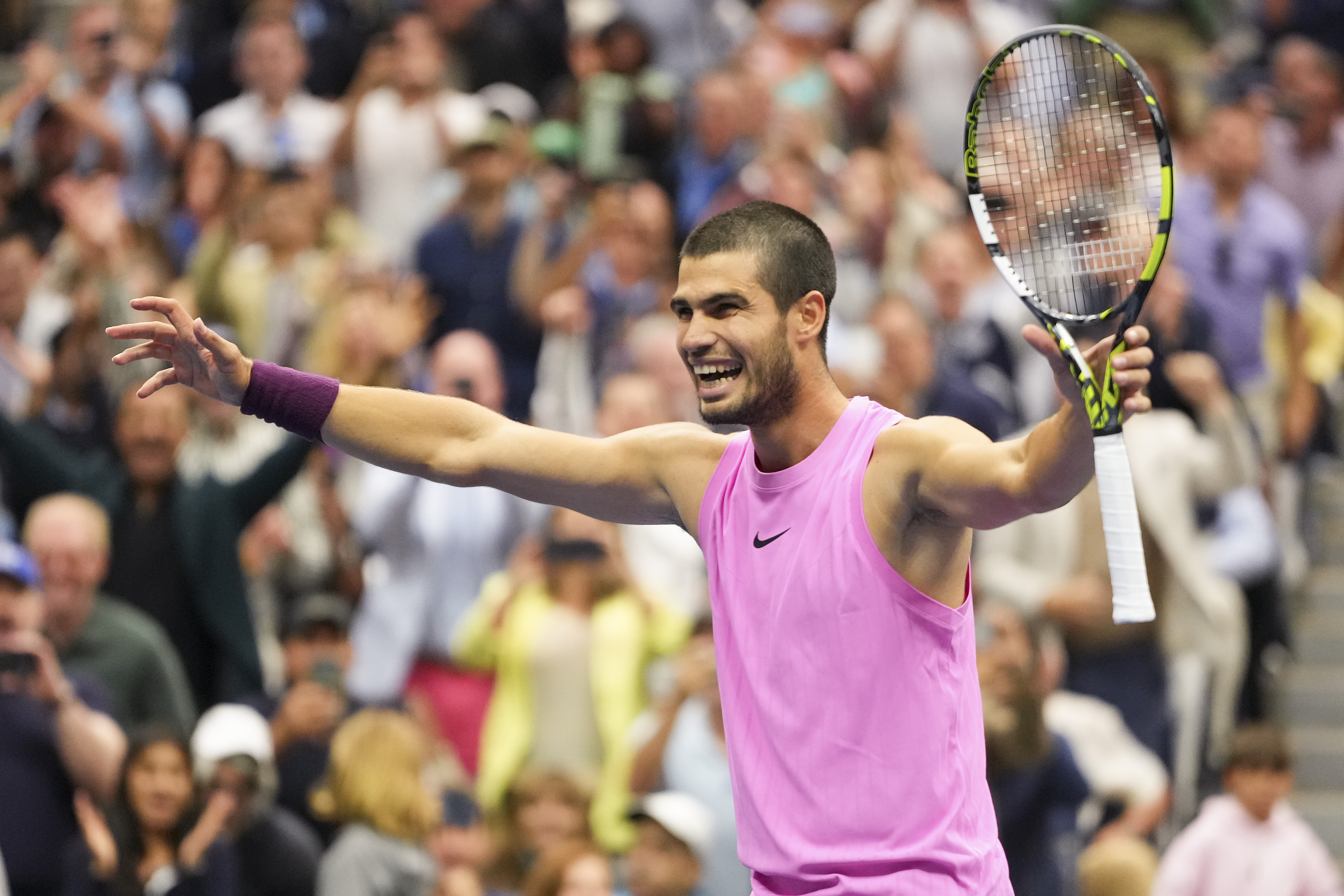 Carlos Alcaraz, of Spain, celebrates after defeating Jannik Sinner, of Italy, in the men's singles final of the U.S. Open tennis championships, Sunday, Sept. 7, 2025, in New York. (AP Photo/Kirsty Wigglesworth)